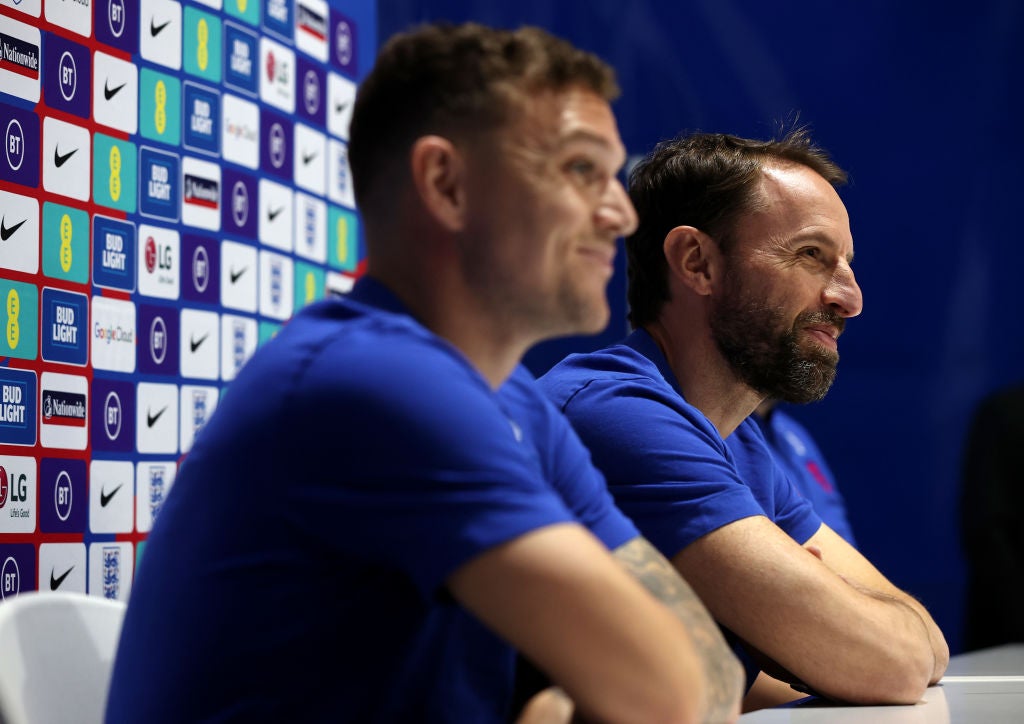 England wing-back Kieran Trippier with manager Gareth Southgate, speaking during a press conference at Andorra’s Estadi Nacional