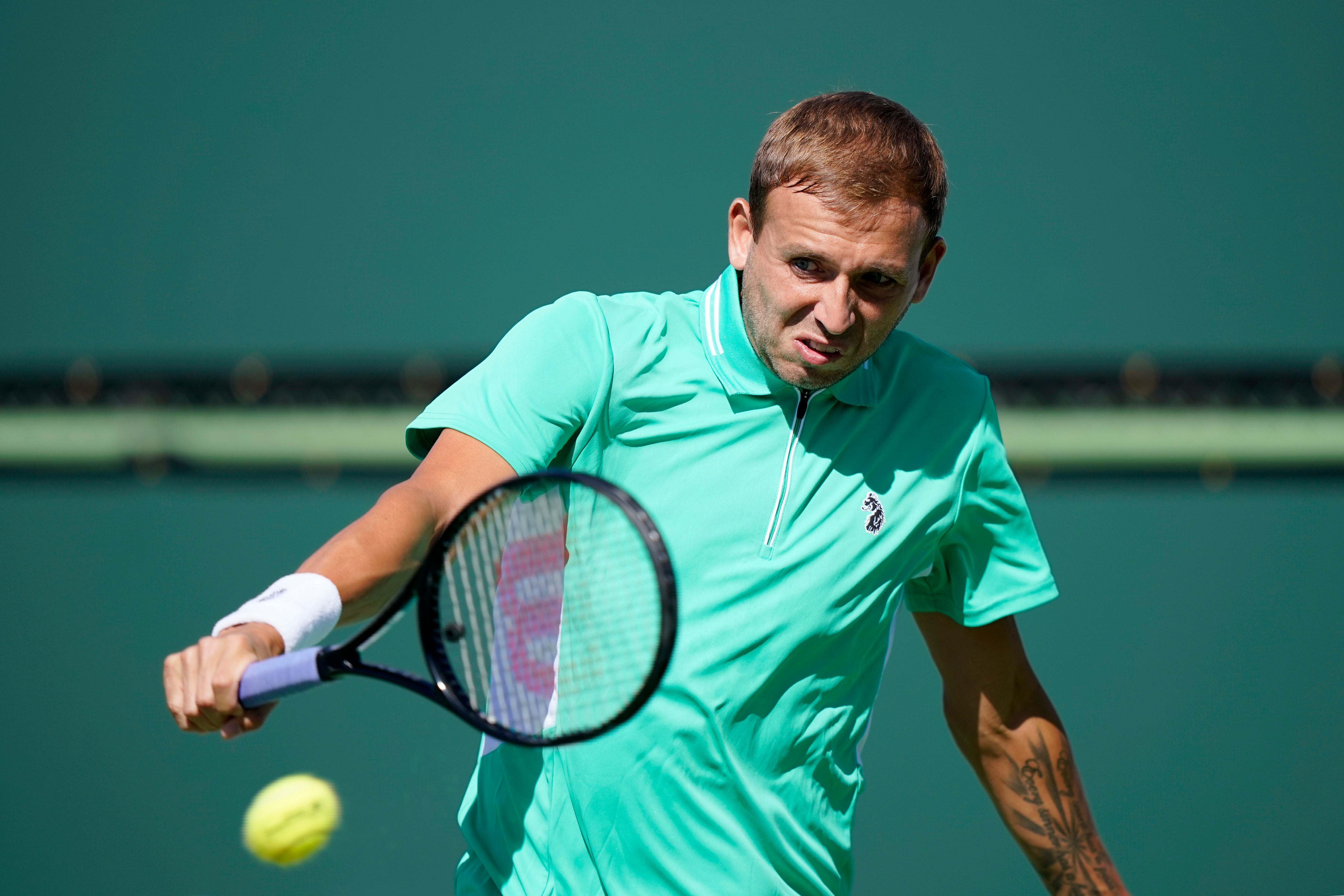 Dan Evans battled to victory over Kei Nishikori (Mark J Terrill/AP)