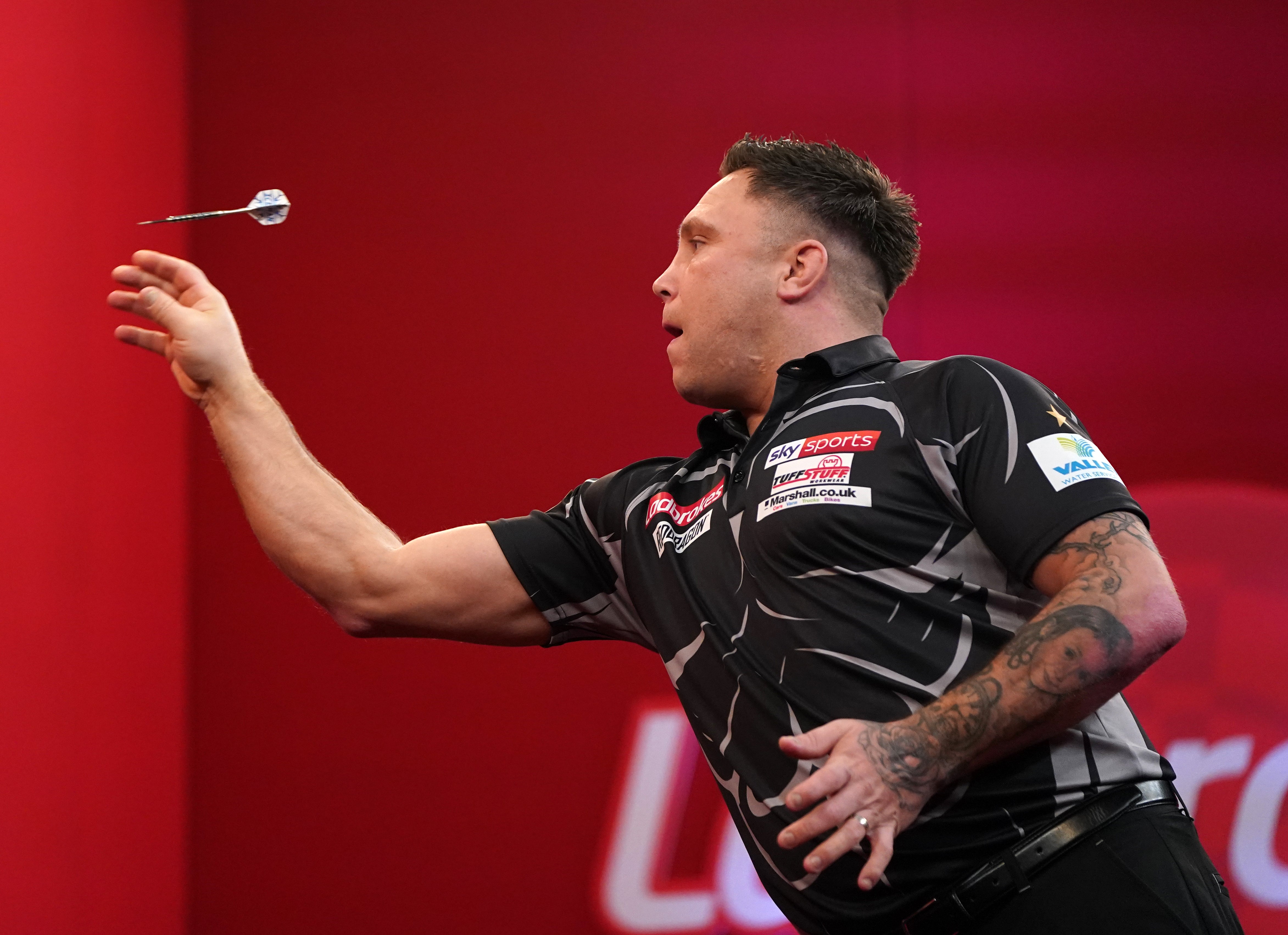 Gerwyn Price looks to defend his title (Zac Goodwin/PA)