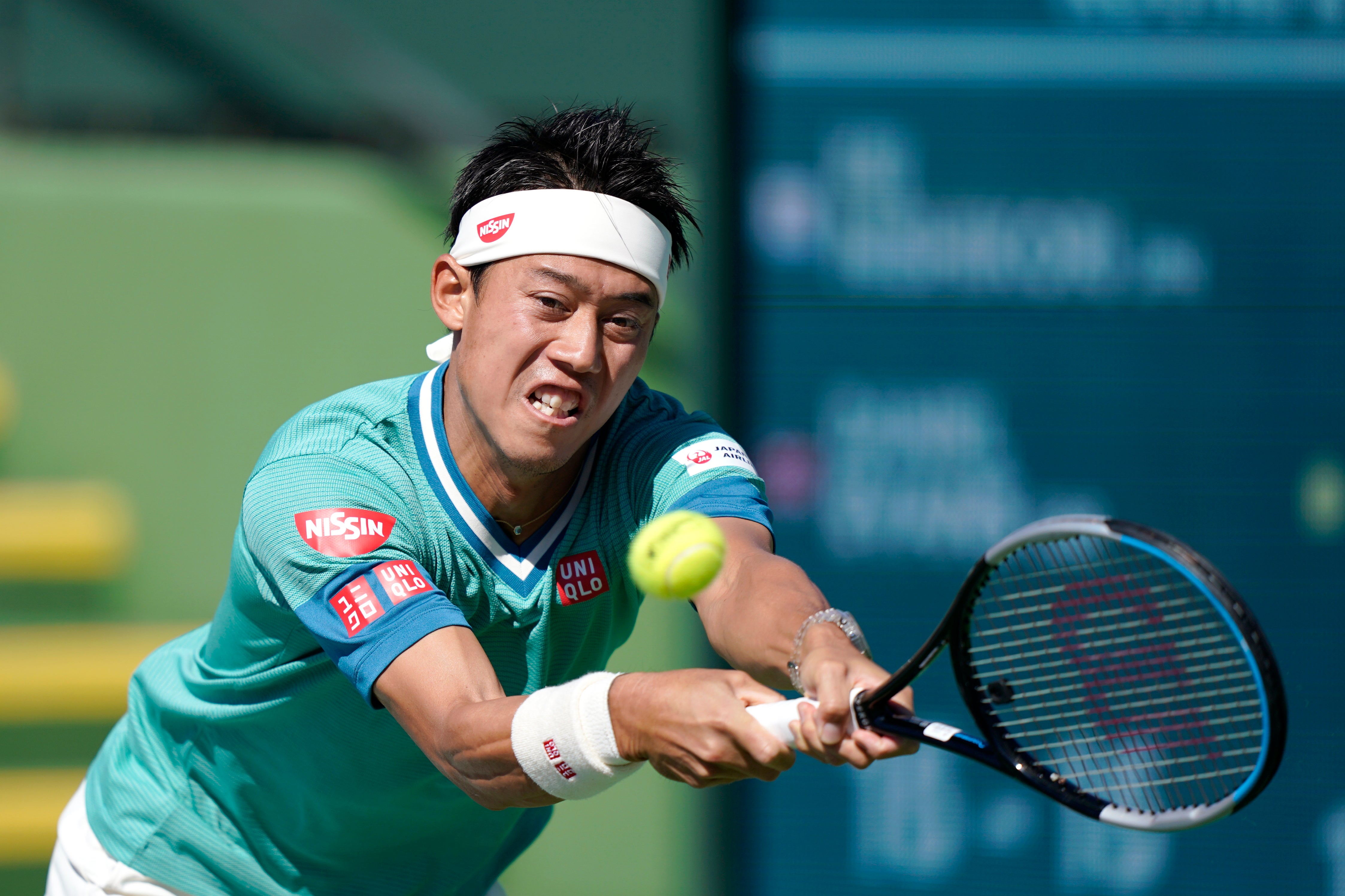 Kei Nishikori stretches for a backhand (Mark J Terrill/AP)