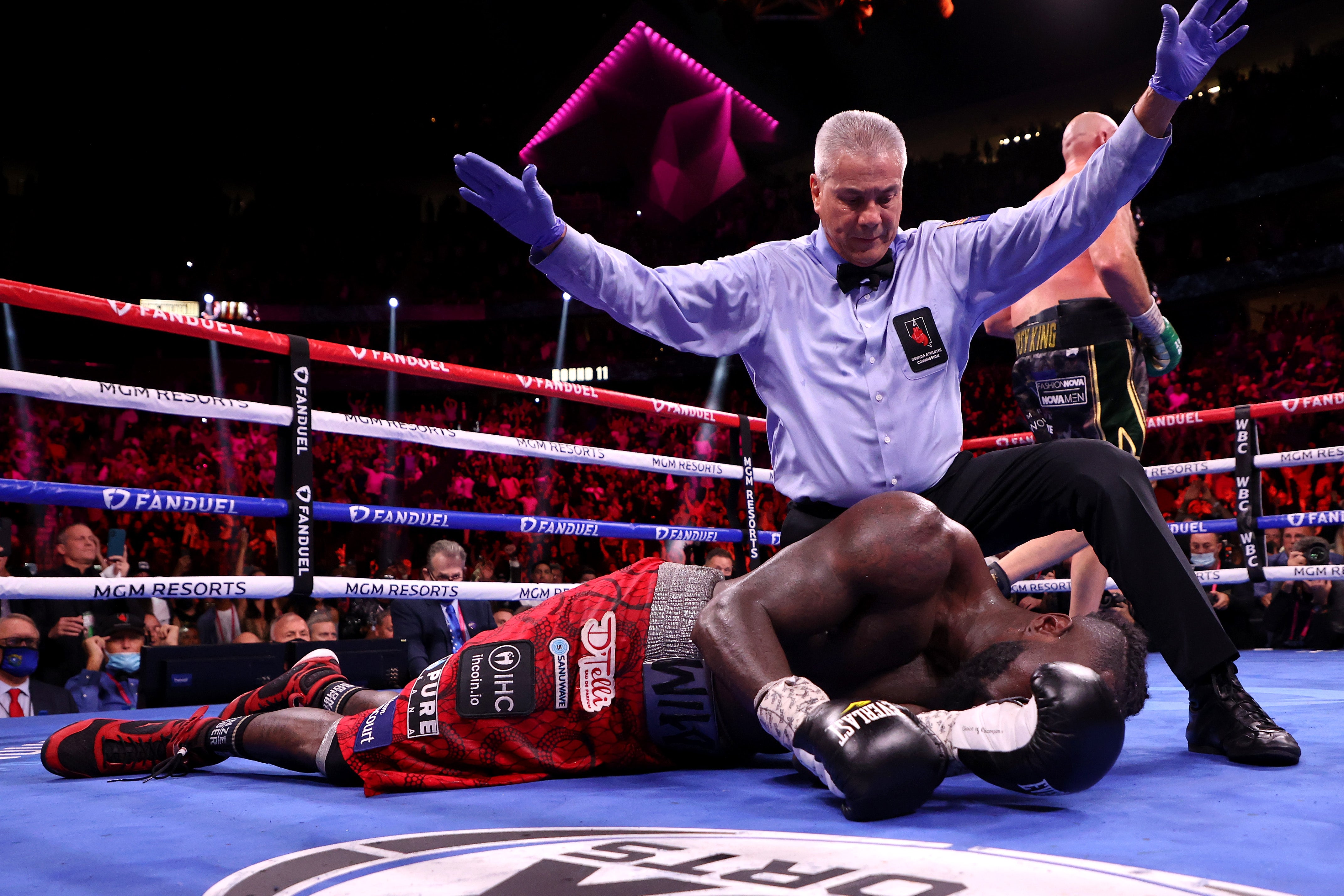 Referee Russell Mora calls the fight after Tyson Fury knocked out Deontay Wilder