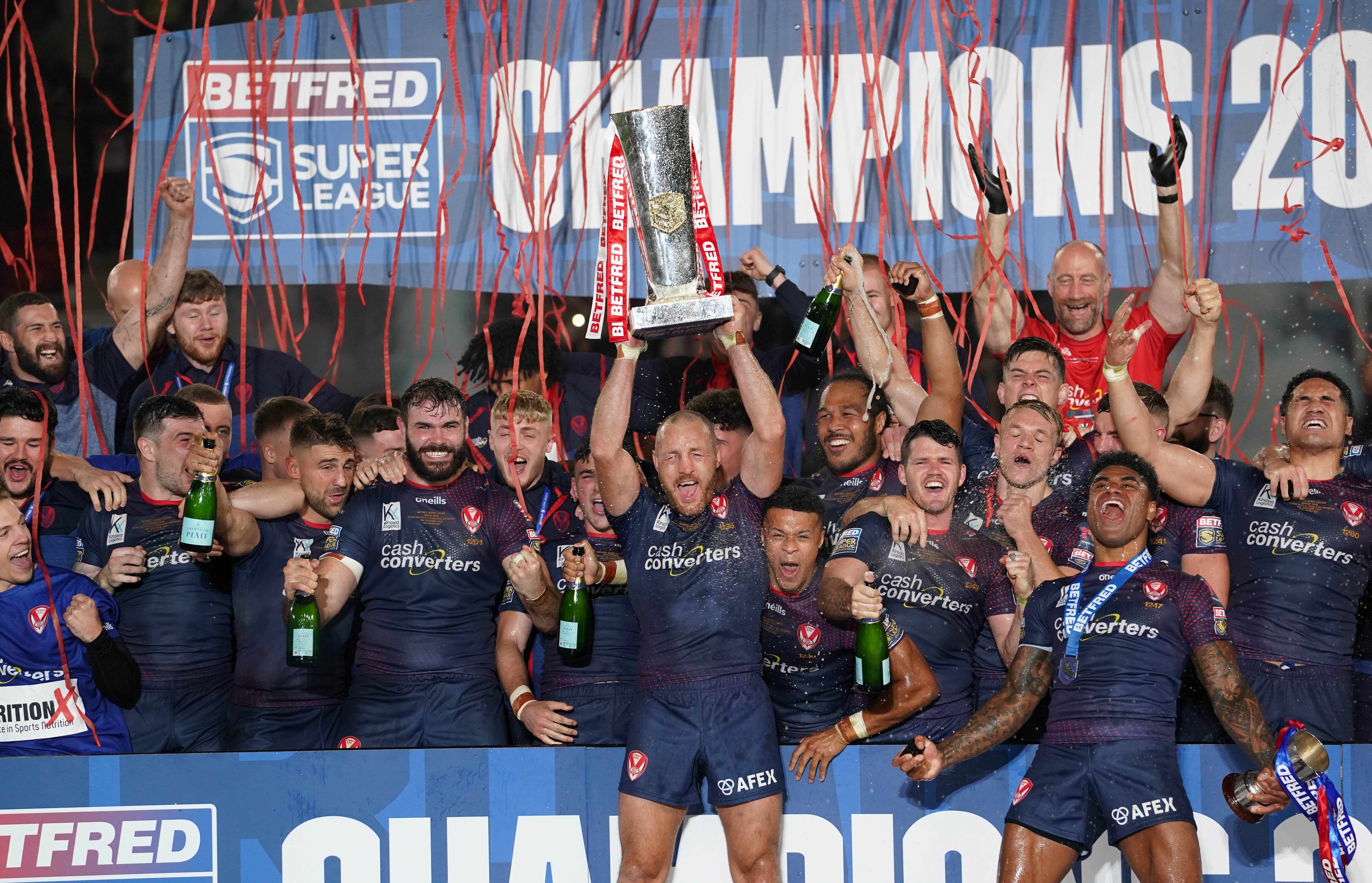 St Helens captain James Roby lifts the trophy after his side’s eighth Grand Final triumph