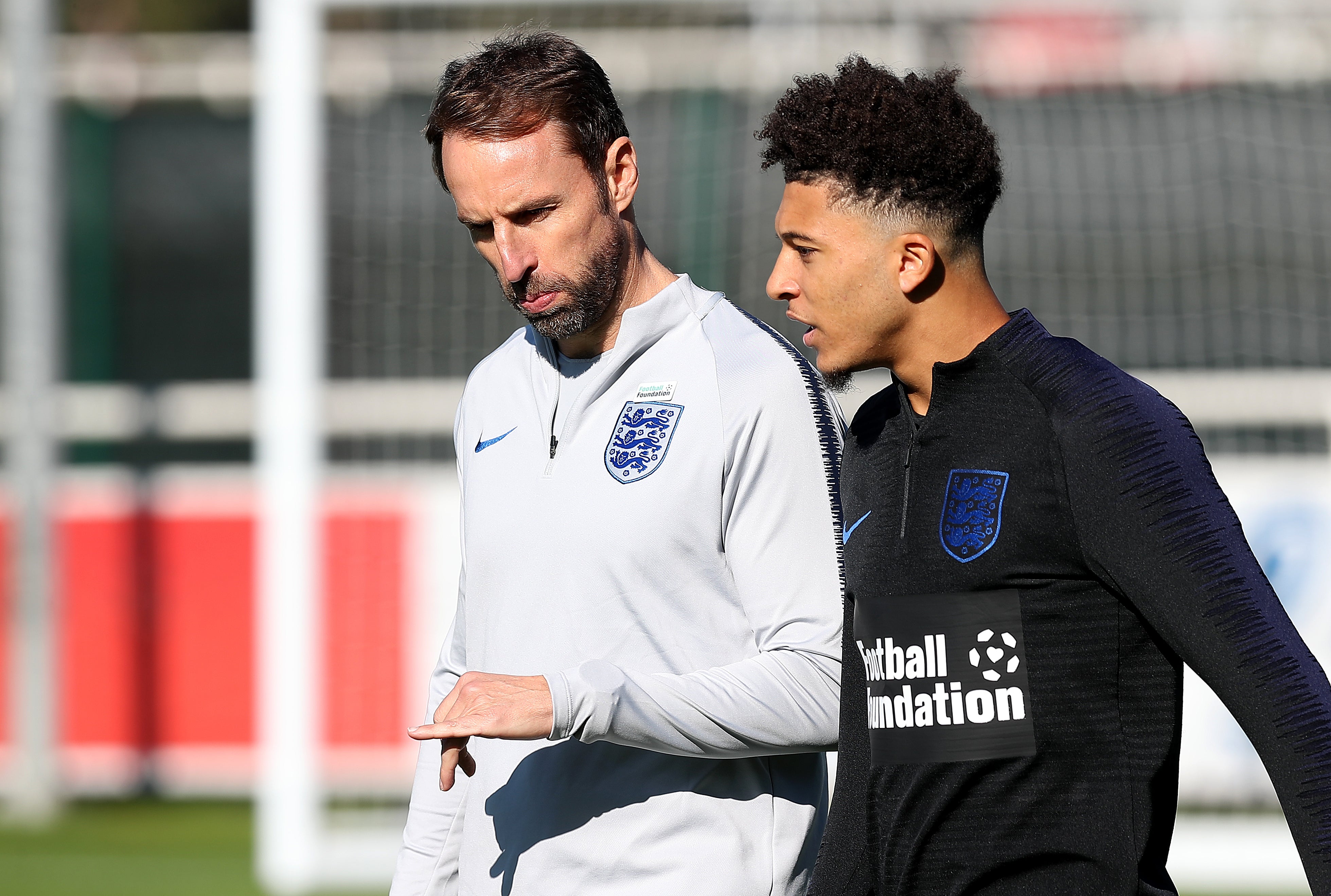Gareth Southgate, left, has urged patience with Jadon Sancho (Martin Rickett/PA)