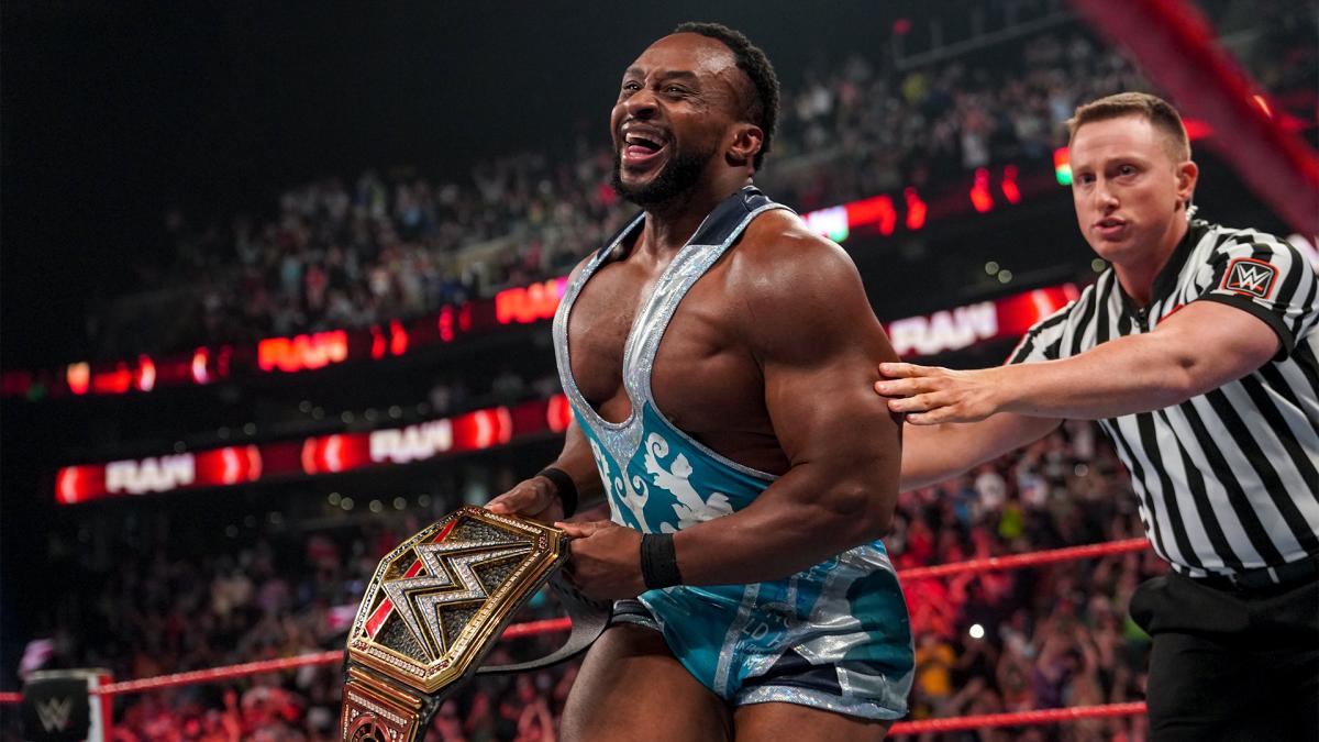 Big E celebrates winning the WWE title