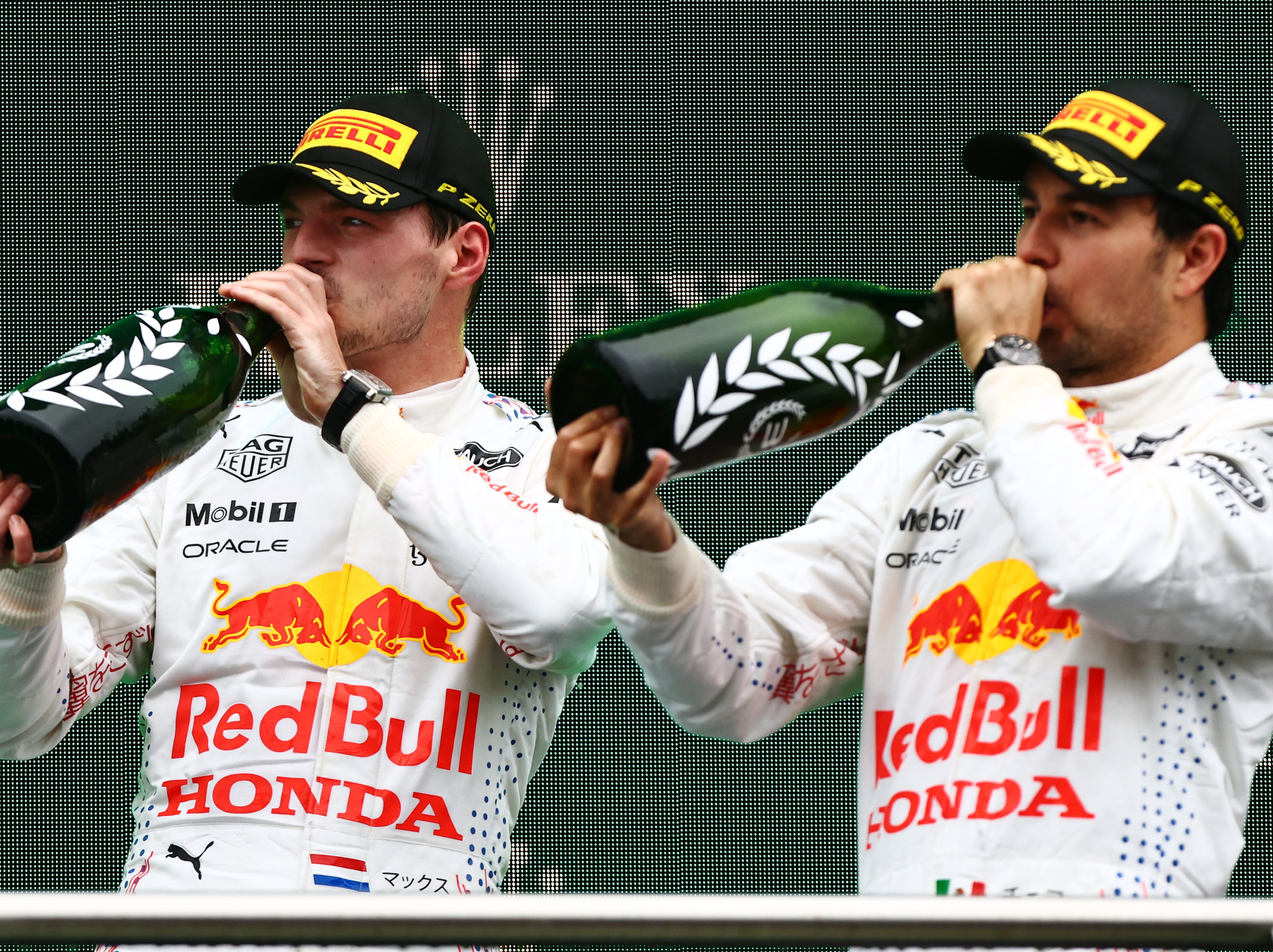 Max Verstappen (left) with Red Bull teammate Sergio Perez in Istanbul