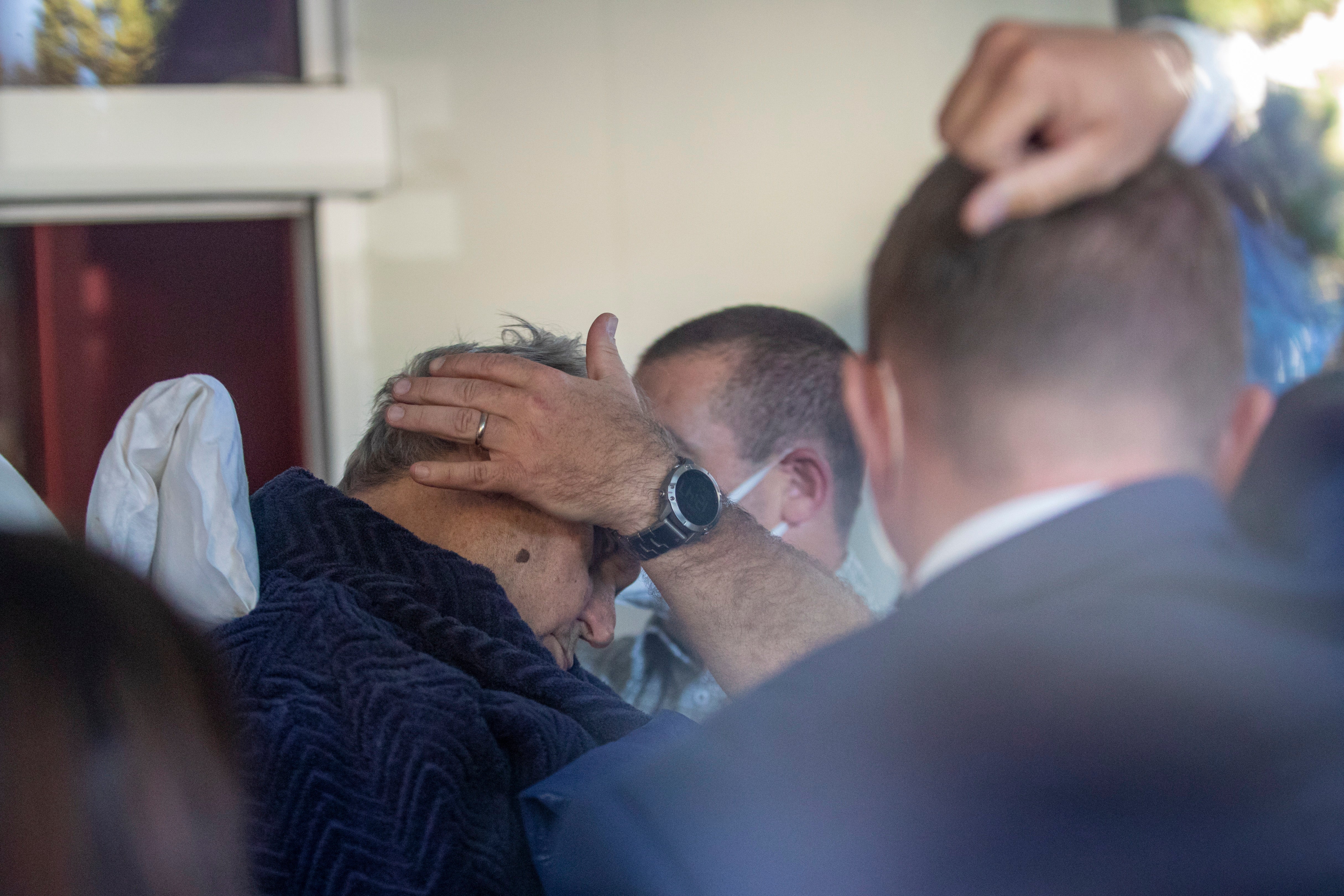 Czech President Milos Zeman arrives on a stretcher at the Central Military Hospital in Prague