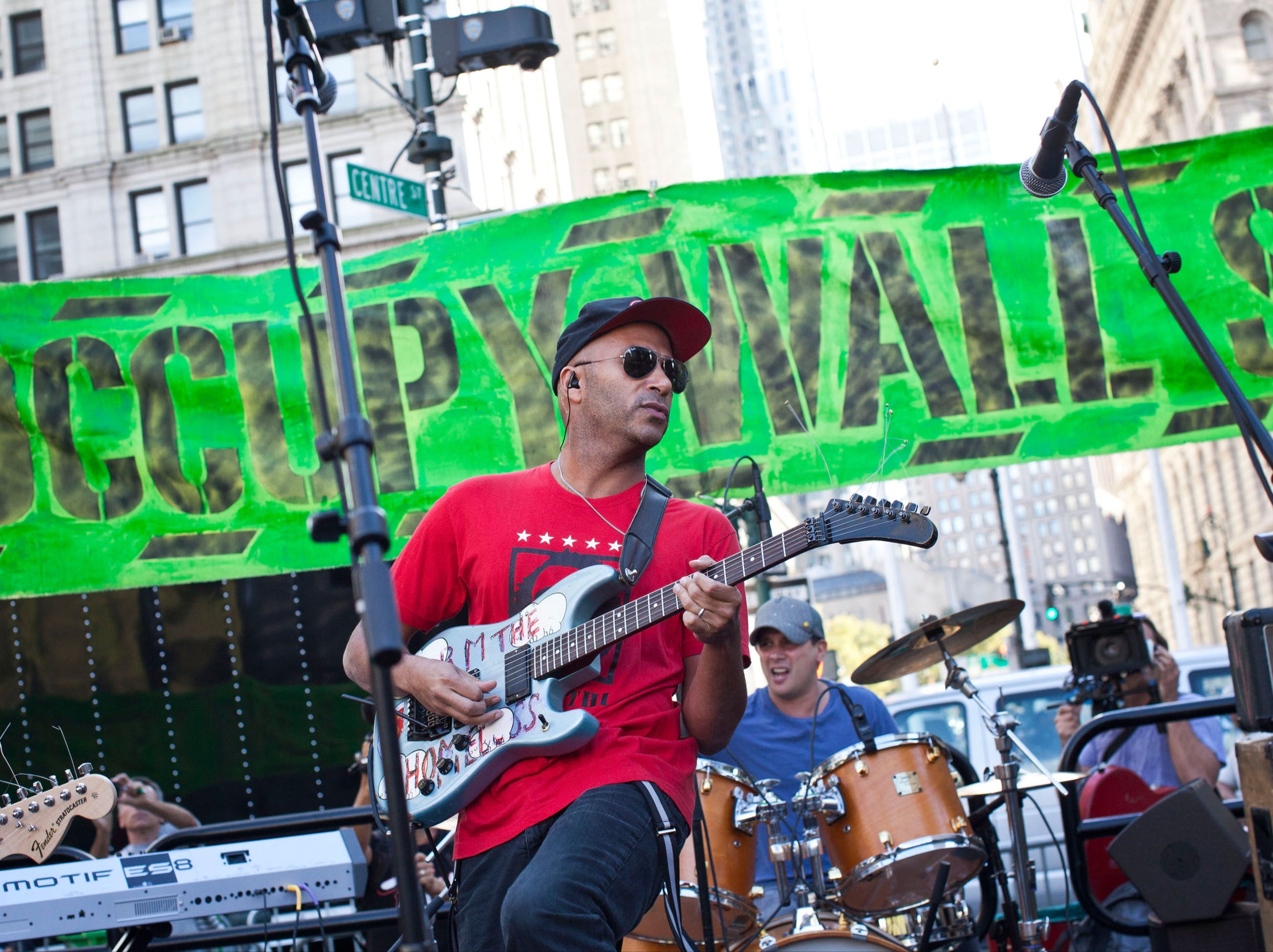 Fight the power: Morello performing with Rage Against the Machine at the Occupy Wall Street protest in 2012