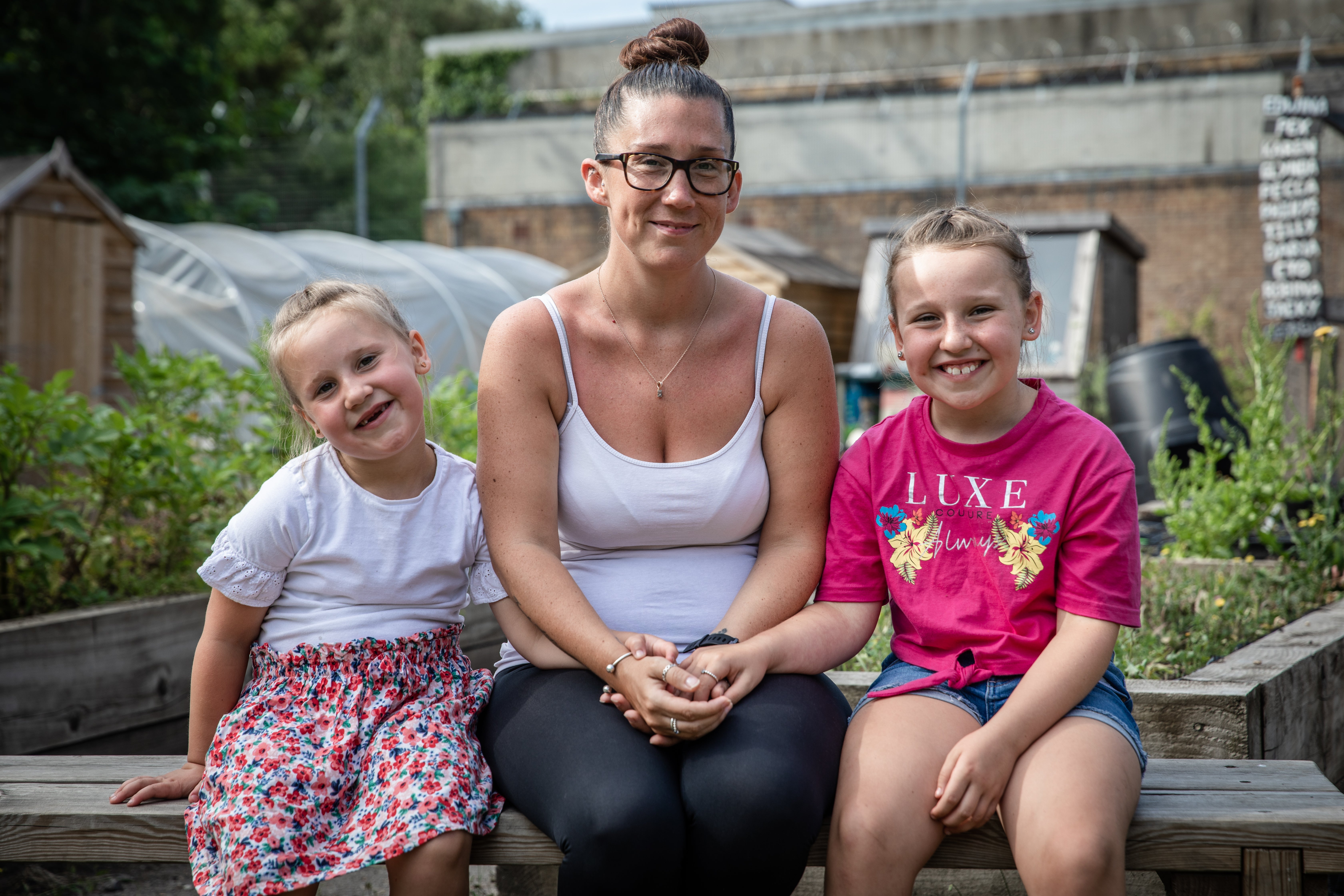 Vikki with her daughters, Amelia and Maisie. She lost her job as a nursery school teacher due to coronavirus but vital support from Save the Children helped her family stay strong during the crisis