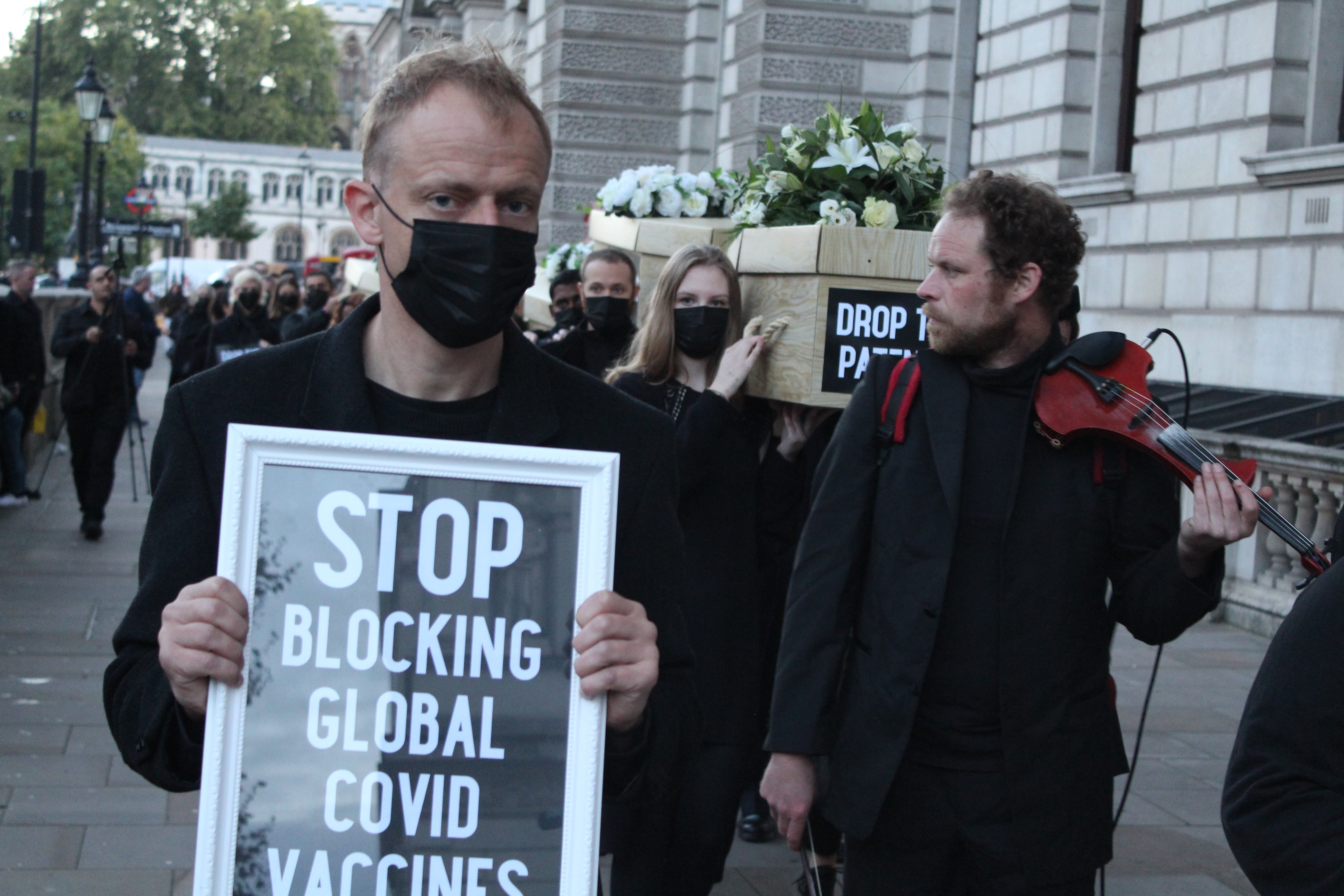 Global Justice Now boss Nick Dearden stands at the front of the march.