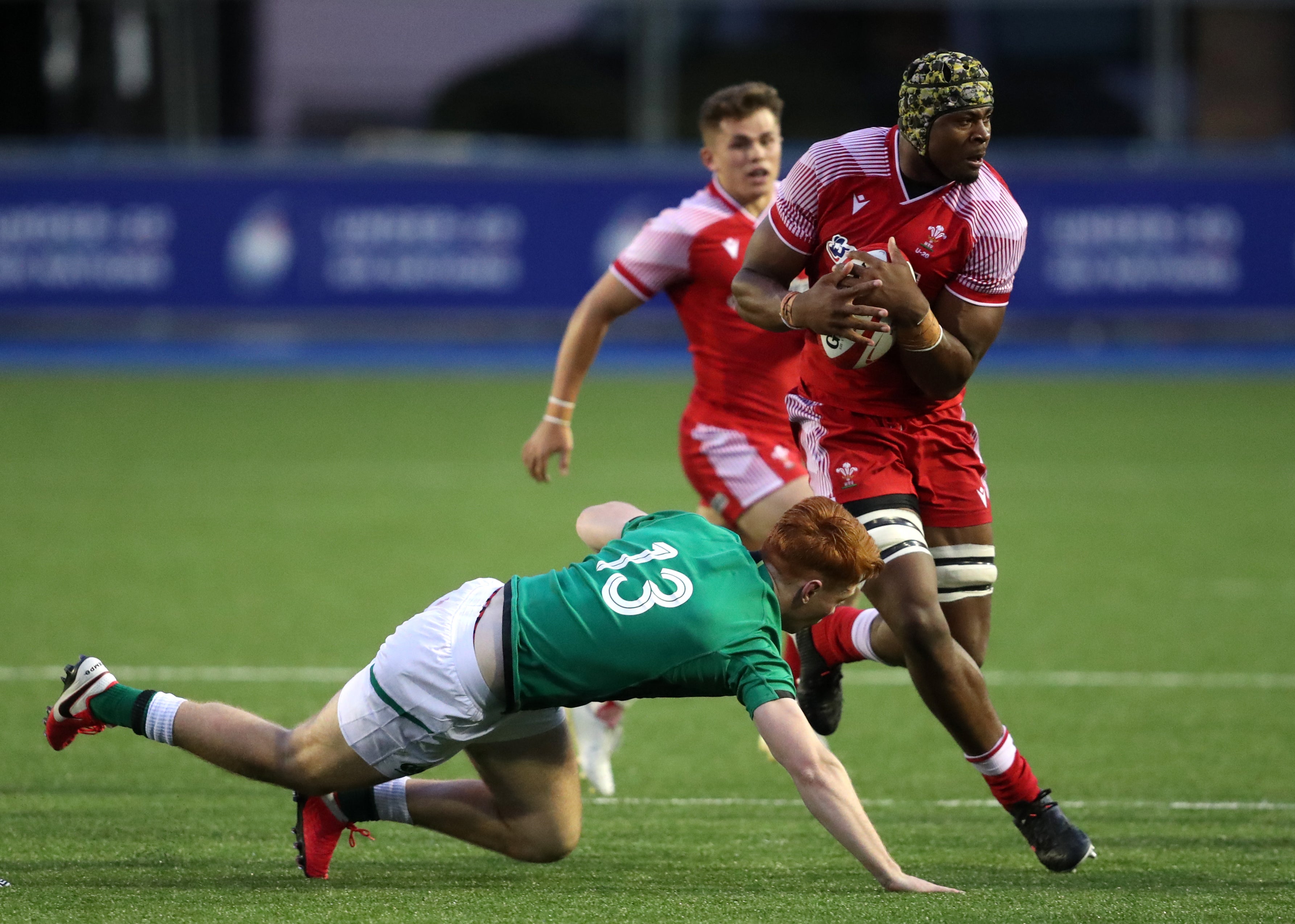 Christ Tshiunza in action for Wales Under-20s (David Davies/PA).