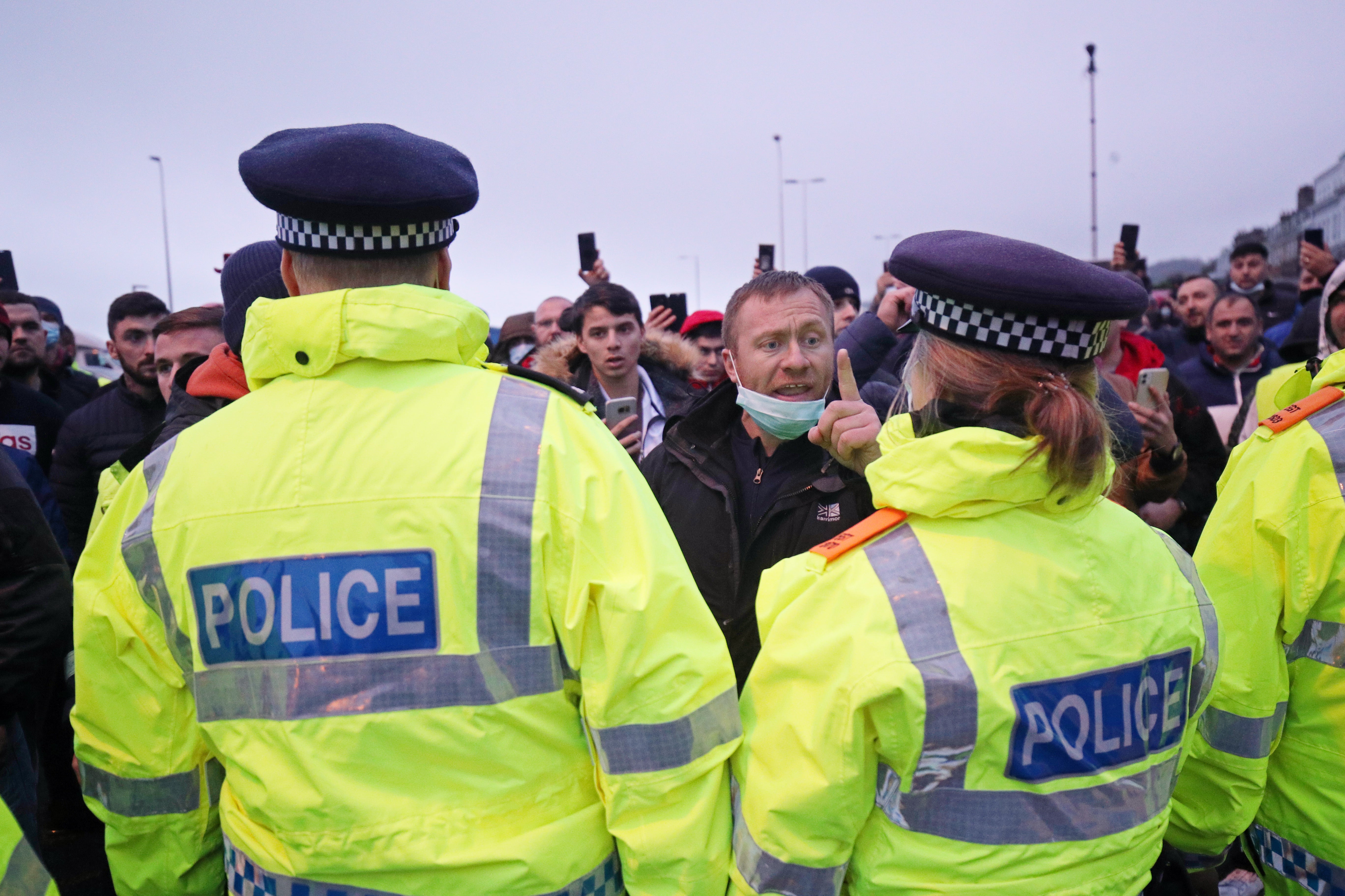 Police holding back drivers trying to enter the Port of Dover in Kent (Steve Parsons/PA)