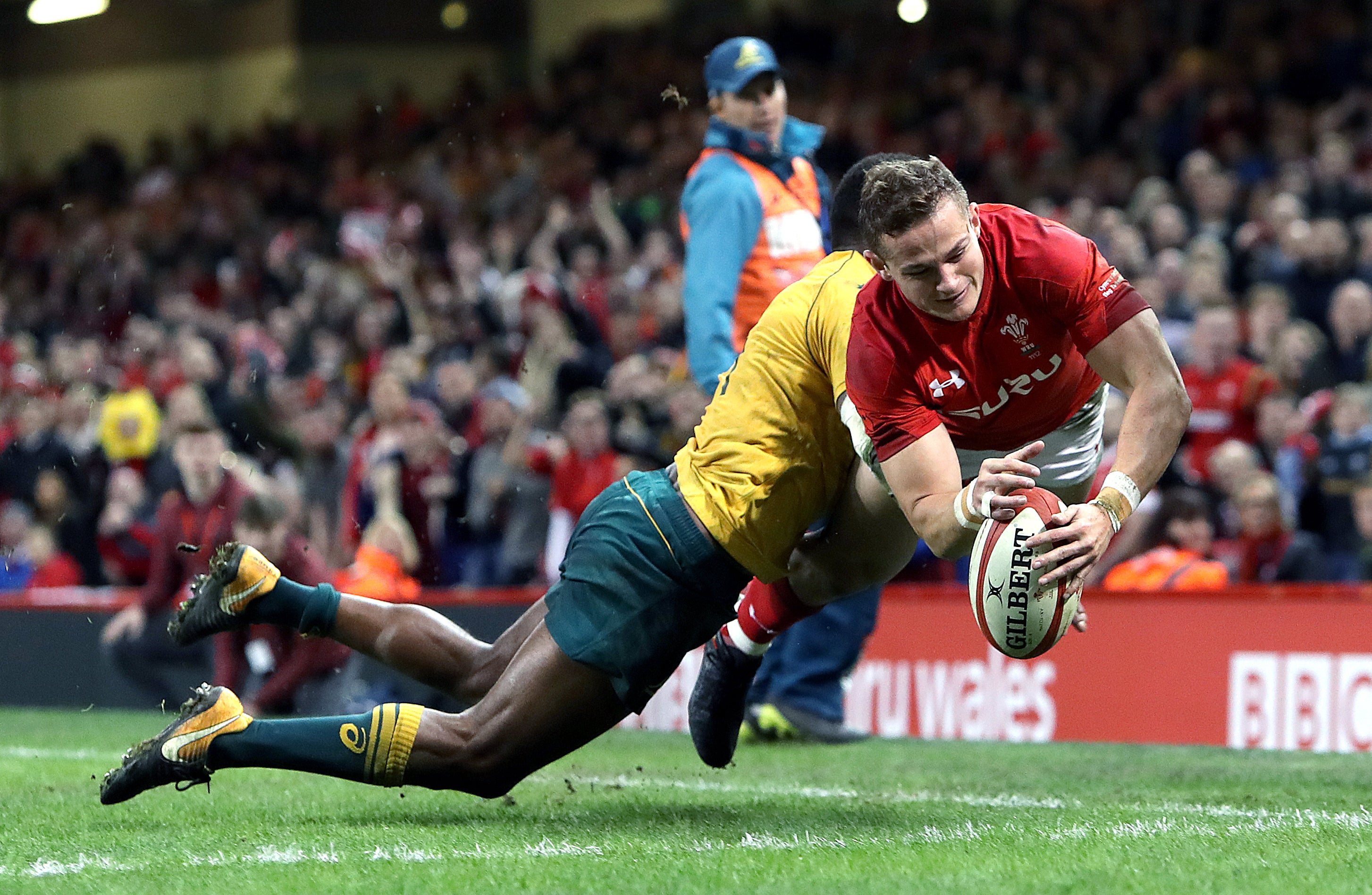 Wales full-back Hallam Amos (right) has announced his retirement at the age of 27 (David Davies/PA)