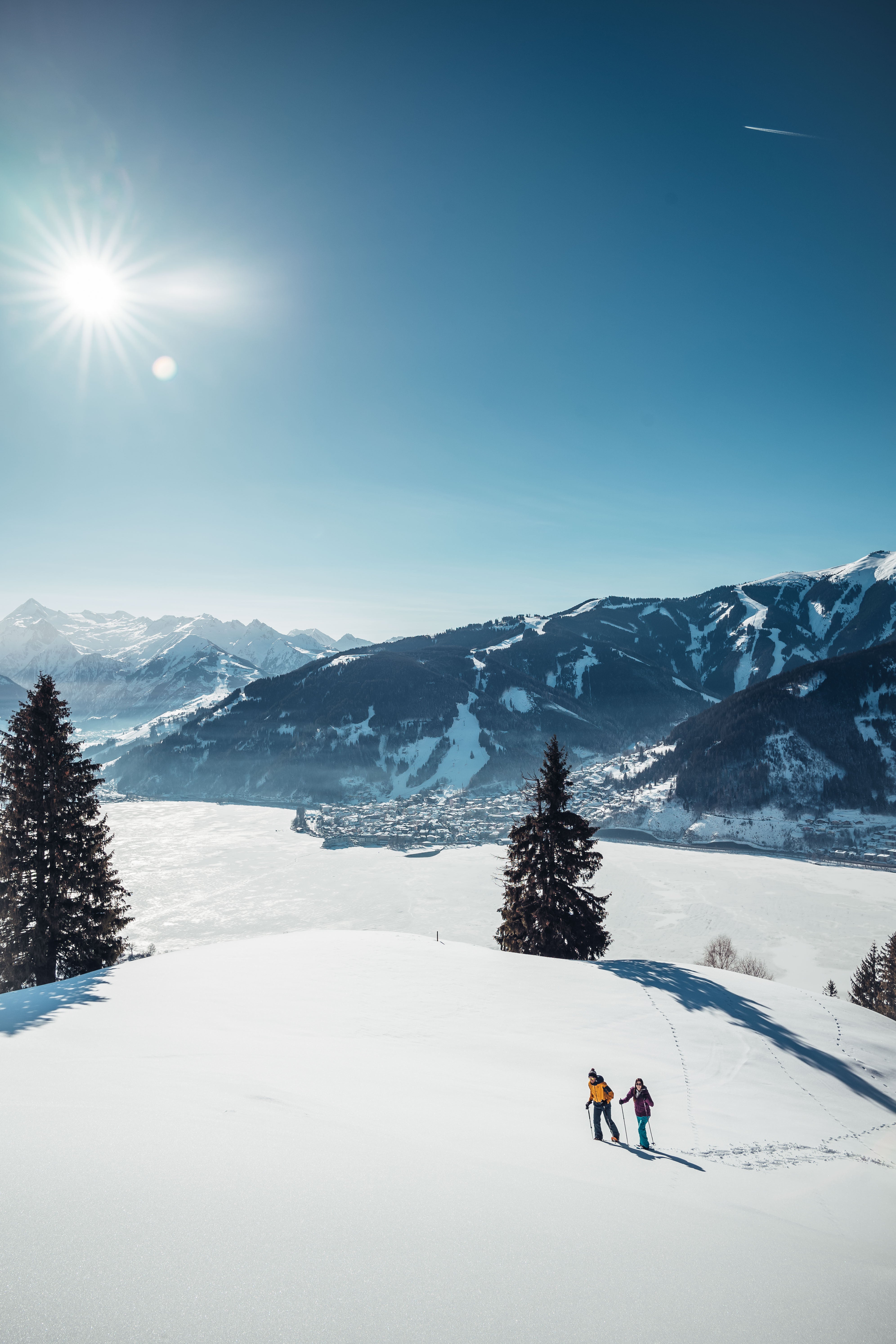 Try snowshoeing with a view of Lake Zell