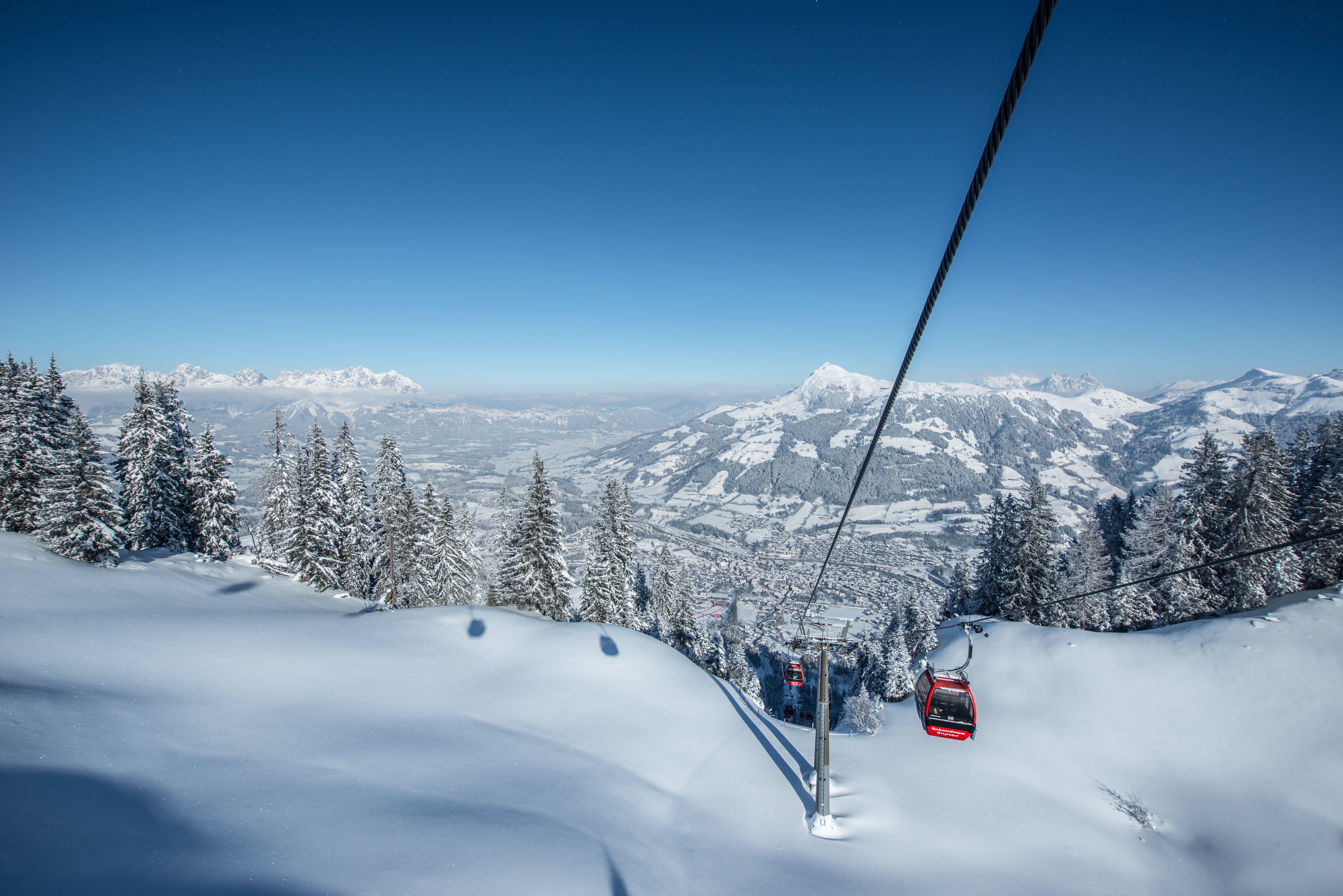 Cable cars descending the slopes in Kitzbühel