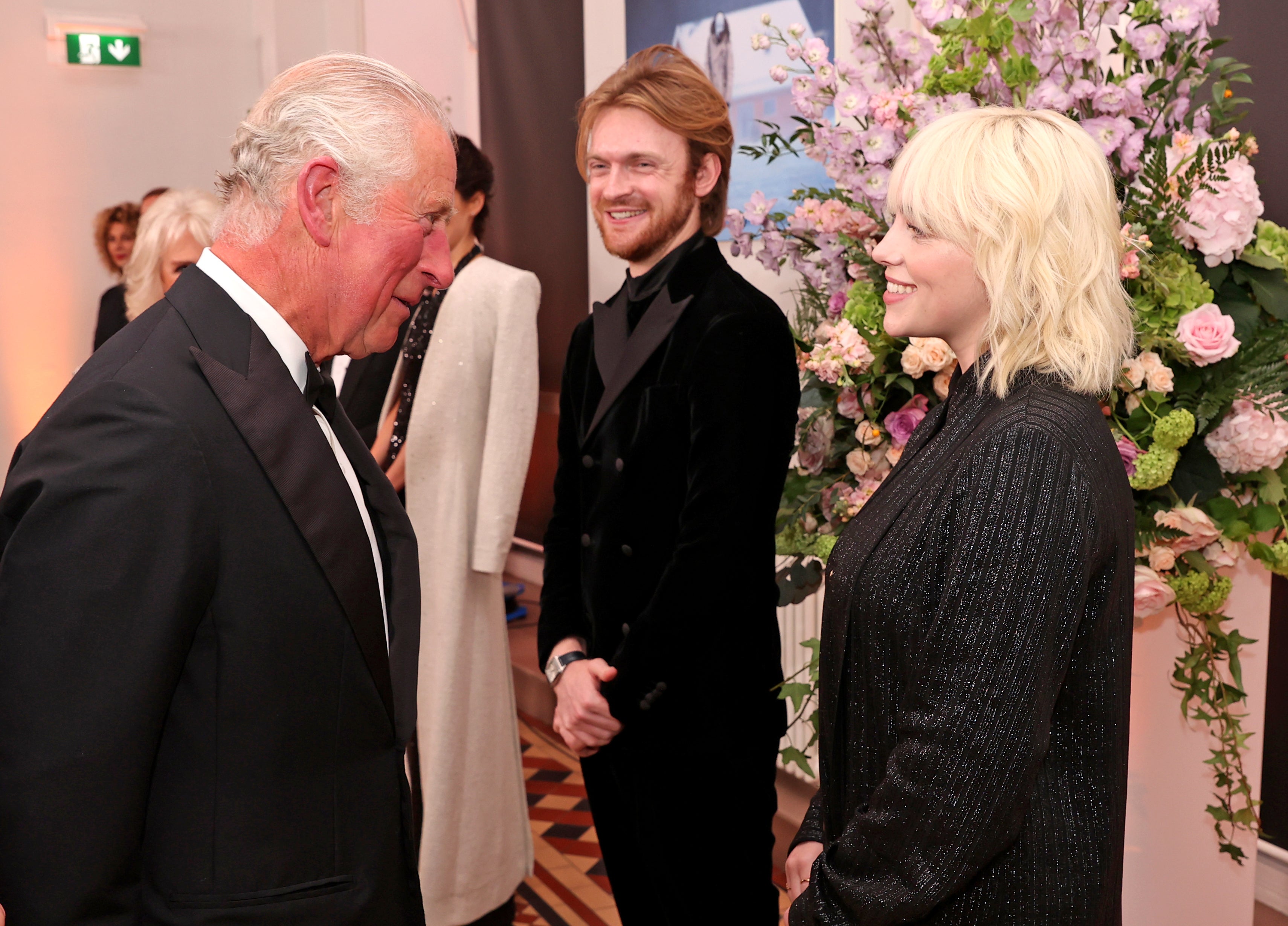 Billie Eilish speaks with Prince Charles at James Bond premiere