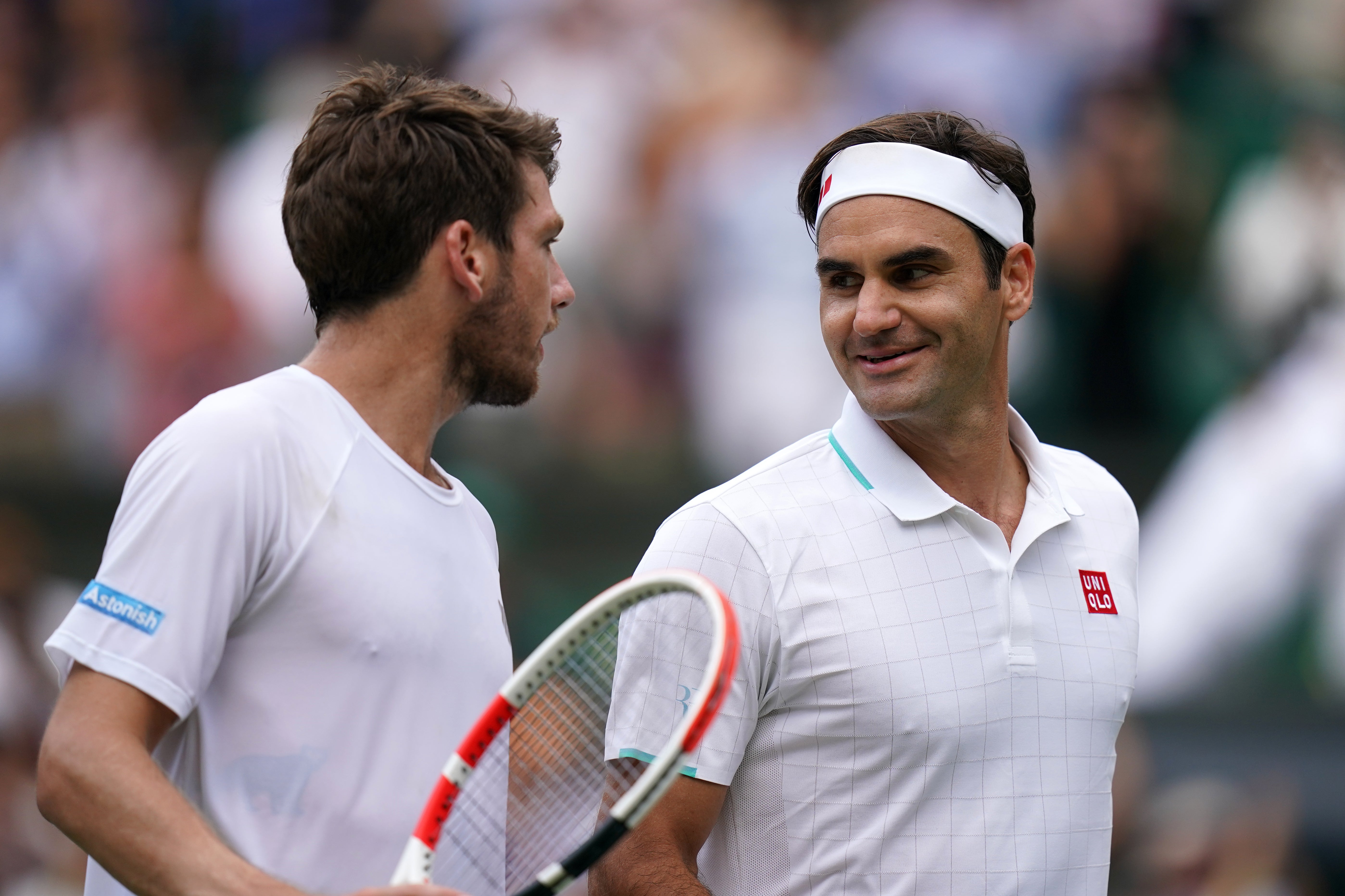 Cameron Norrie (left) faced Roger Federer at Wimbledon this summer (Adam Davy/PA)