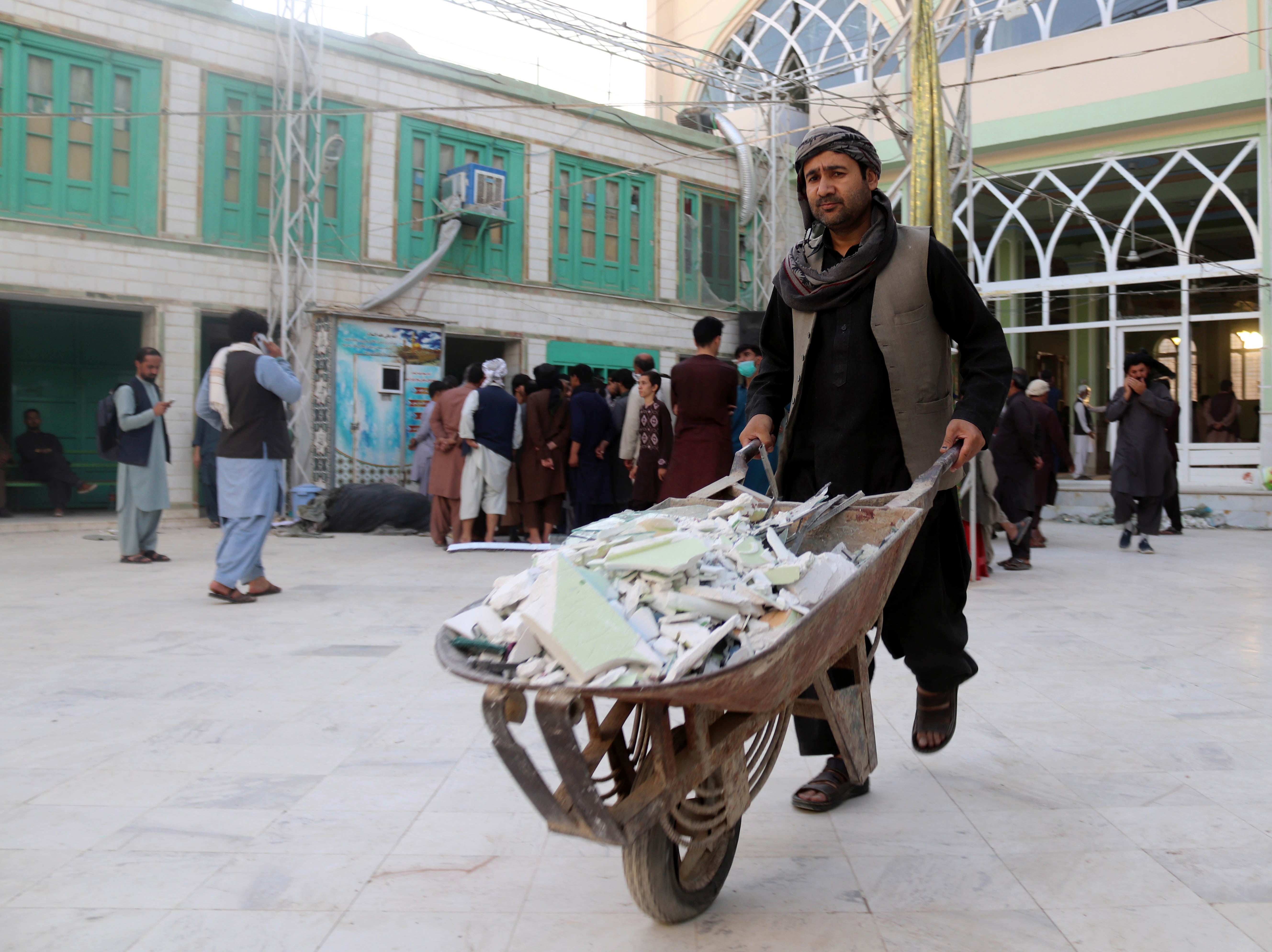 Clearing up after the attack in Kandahar