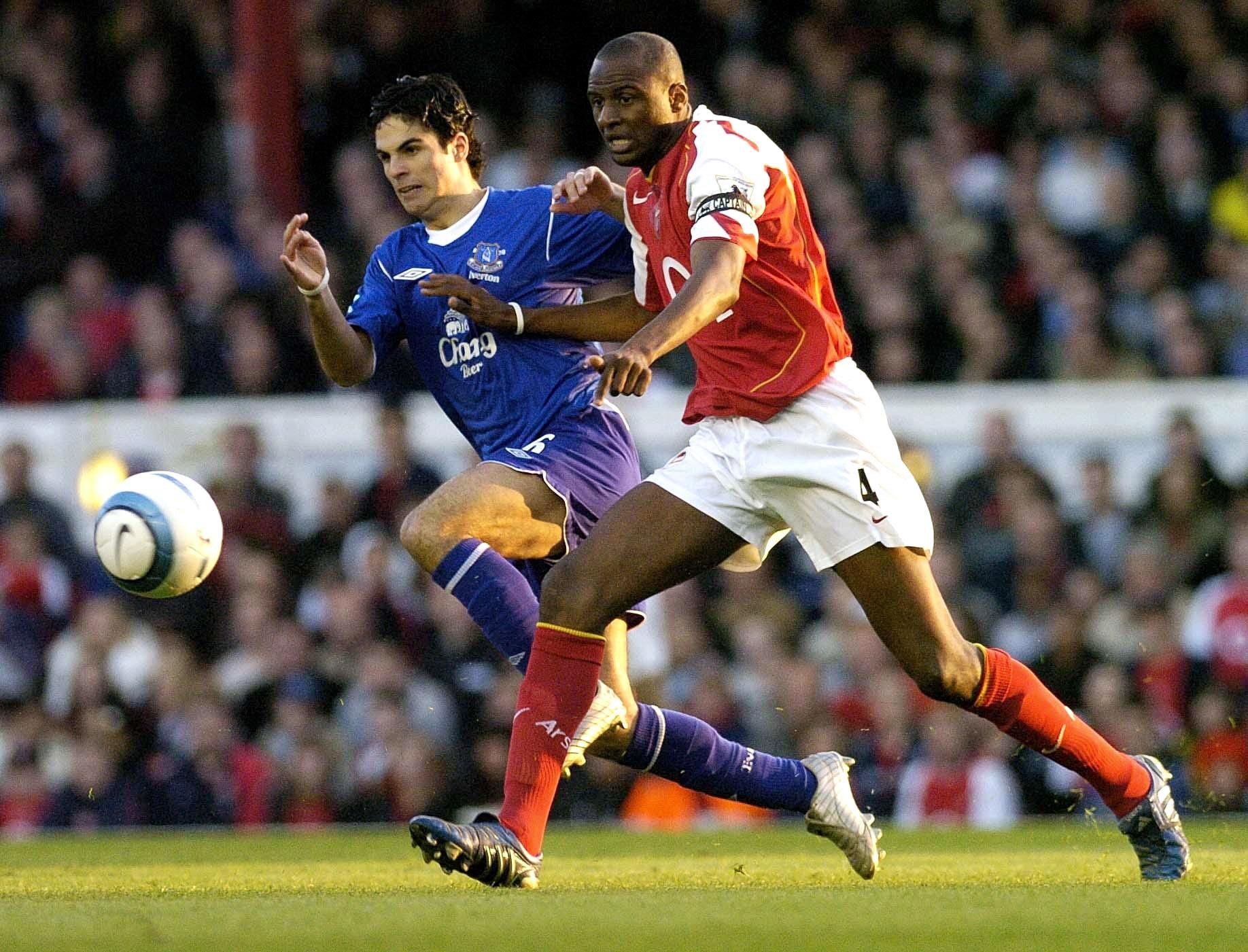 Patrick Vieira, right, in action against Mikel Arteta (Rebecca Naden/PA)