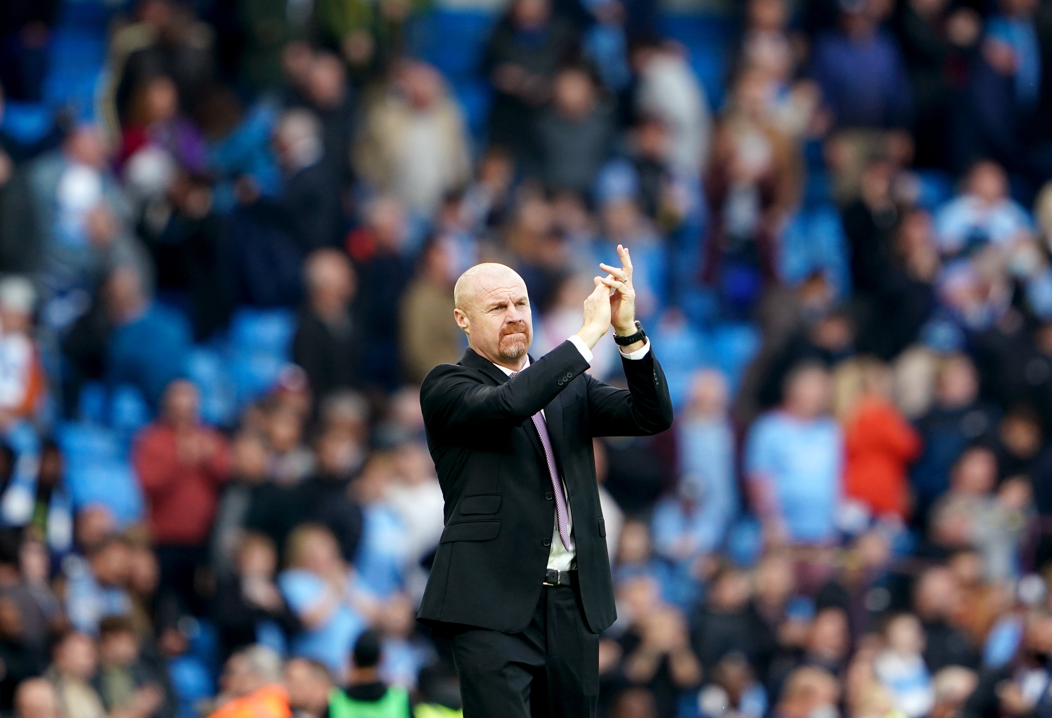 Burnley manager Sean Dyche applauds the fans at the Etihad (Zac Goodwin/PA)