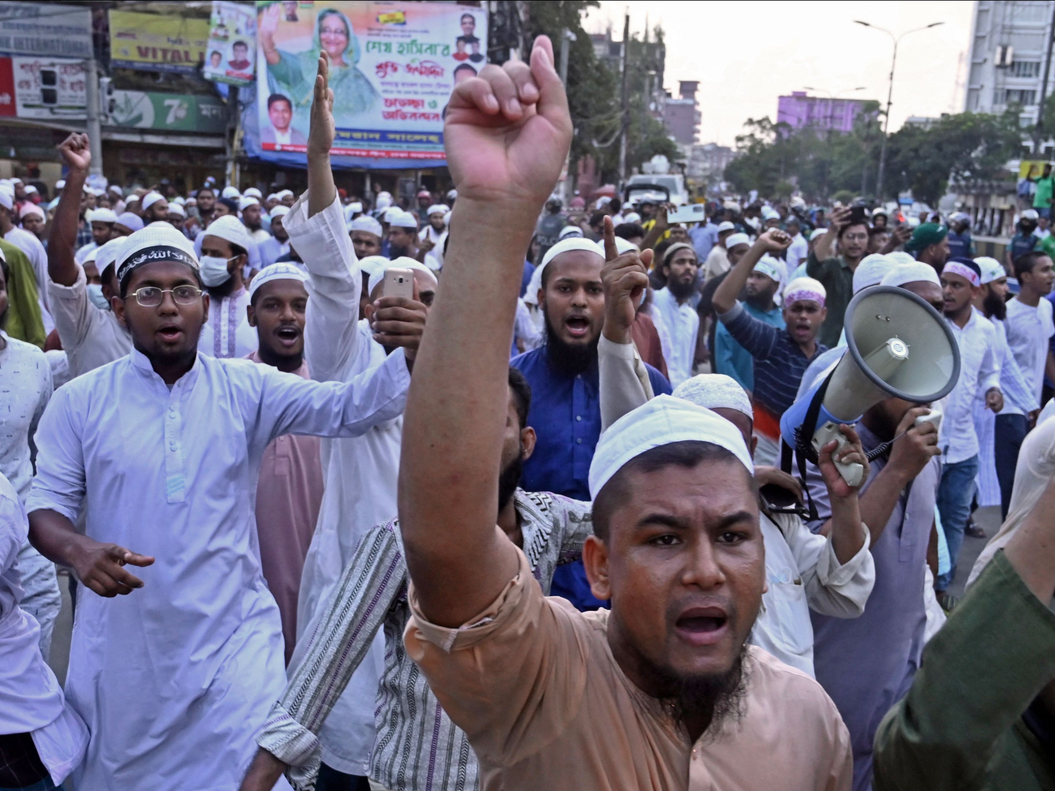 Activists of Islami Andolan Bangladesh take part in a protest outside the National Mosque in Dhaka