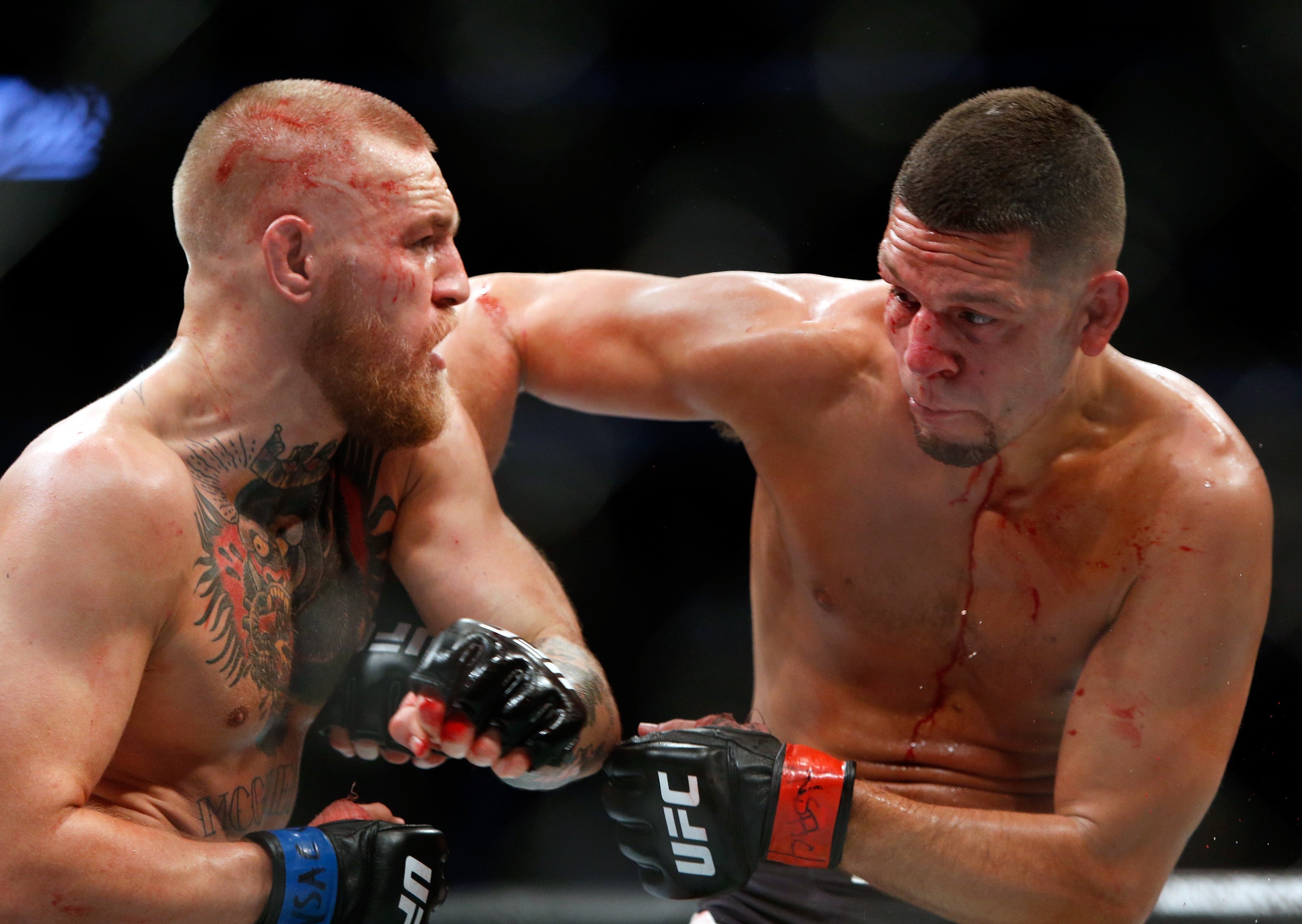 Conor McGregor and Nate Diaz battle during their welterweight rematch at the UFC 202 in 2016