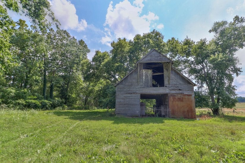 An old barn is also included in the listing, once used for livestock trading