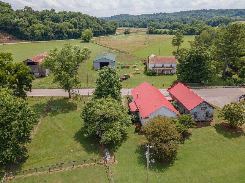The town lies about 43 miles outside Nashville in Tennessee's Highland Rim hills, surrounded by farmland and forest. It once had its own railway stop, but that closed down in 1927