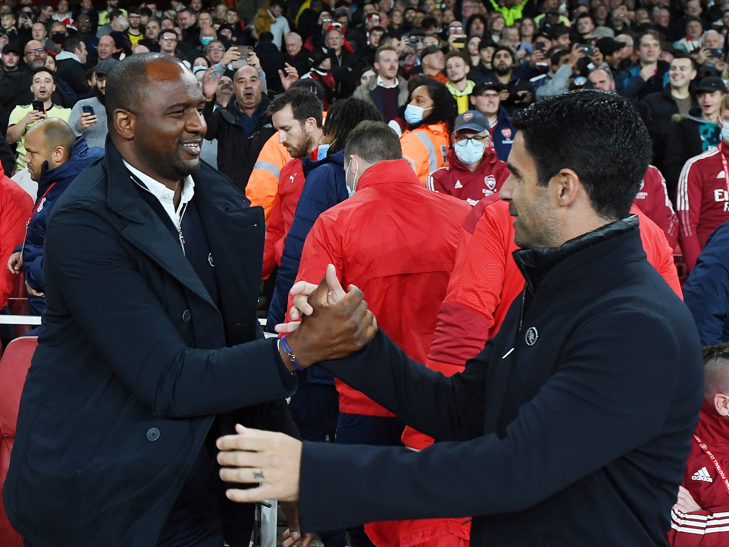 Top Gunners: Vieira and Arteta greet each other before kick-off