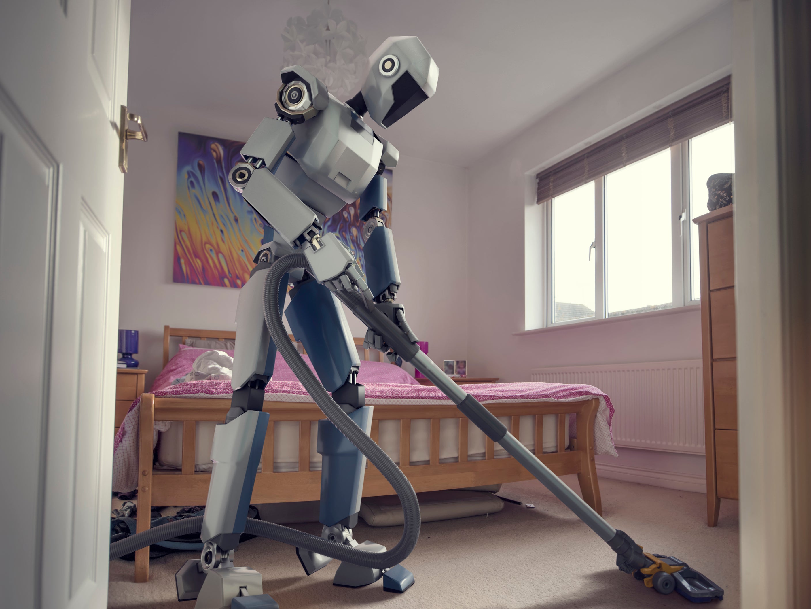 A conceptual image of a generic, blue and white robot holding a vacuum cleaner doing household cleaning chores in bedroom, viewed from a low angle through an open doorway