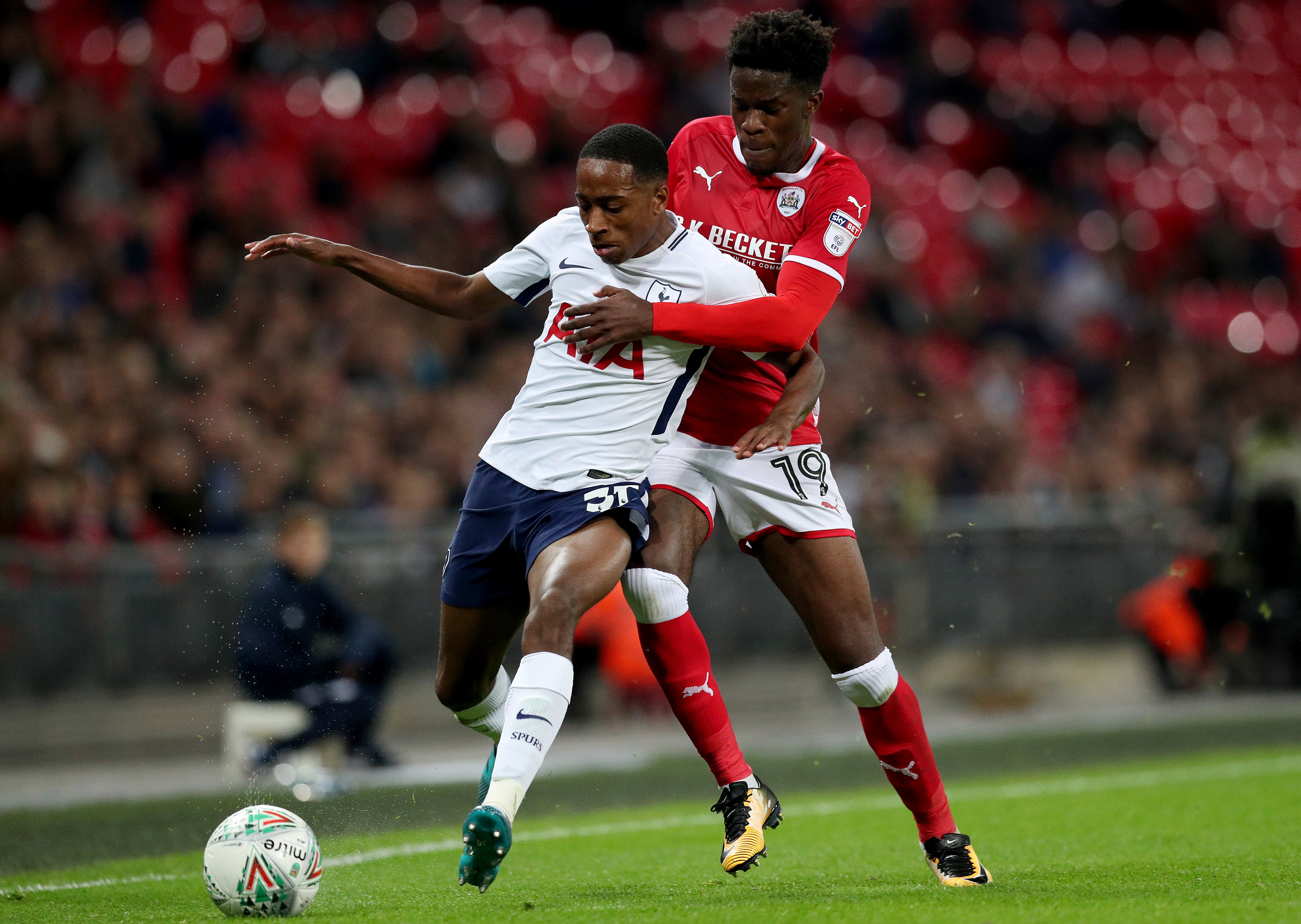 Ugbo, right, spent time on loan at Barnsley, MK Dons and Scunthorpe4. (Jonathan Brady/PA)