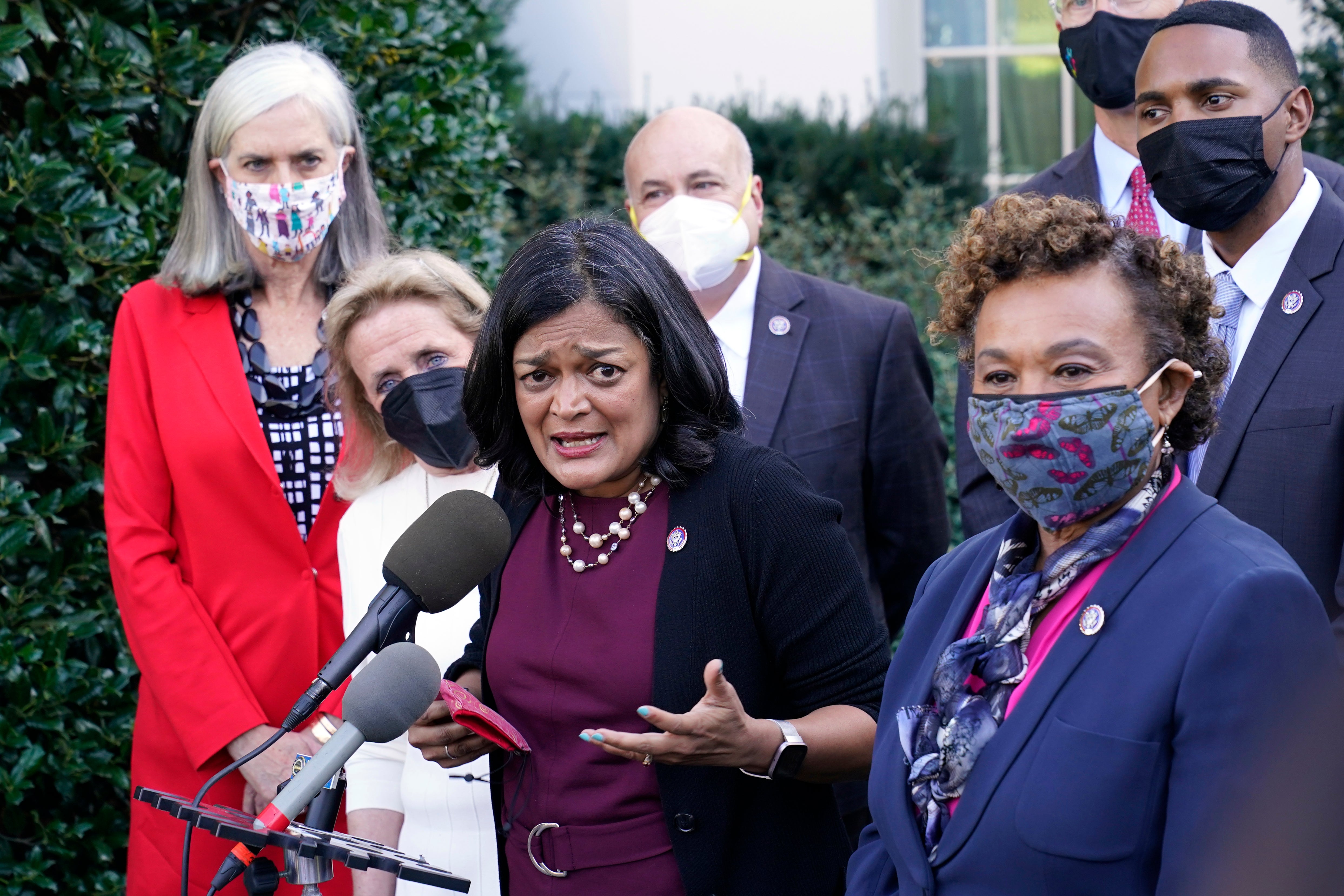 Rep Pramila Jayapal, D-Wash., the chair of the Congressional Progressive Caucus, center, along with other lawmakers, talks with reporters outside the West Wing of the Washington, Tuesday, Oct. 19, 2021, following their meeting with President Joe Biden. Jayapal is joined by from left, Rep. Katherine Clark, D-Mass., Rep. Debbie Dingell, D-Mich., Rep. Mark Pocan, D-Wis., Rep. Barbara Lee, D-Calif., and Rep. Ritchie Torres, D-New York. (AP Photo/Susan Walsh)