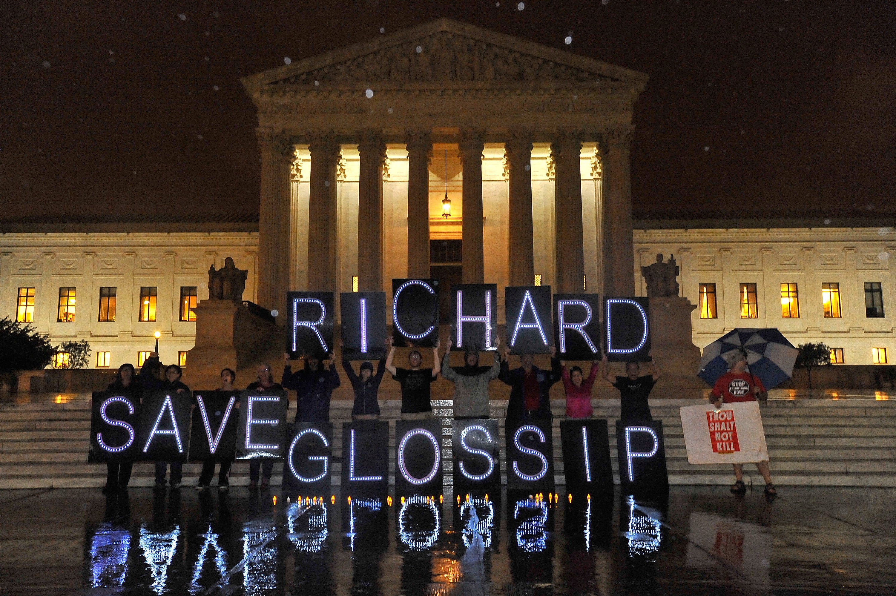 Anti-death penalty activists rally outside the U.S. Supreme Court in 2015 after an attempt to prevent the execution of Glossip