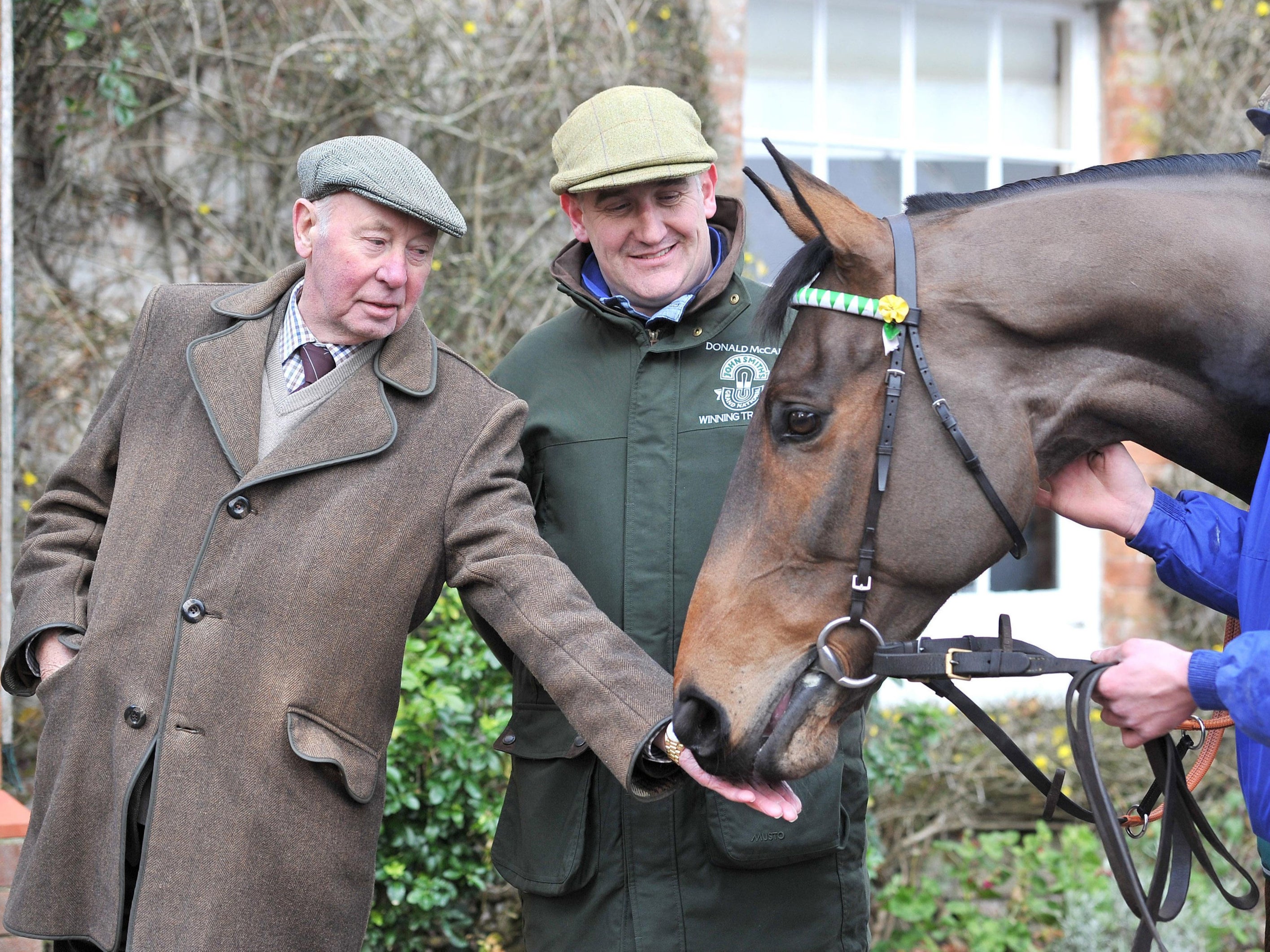 Hemmings with his horse and trainer Donald McCain Jnr in 2012