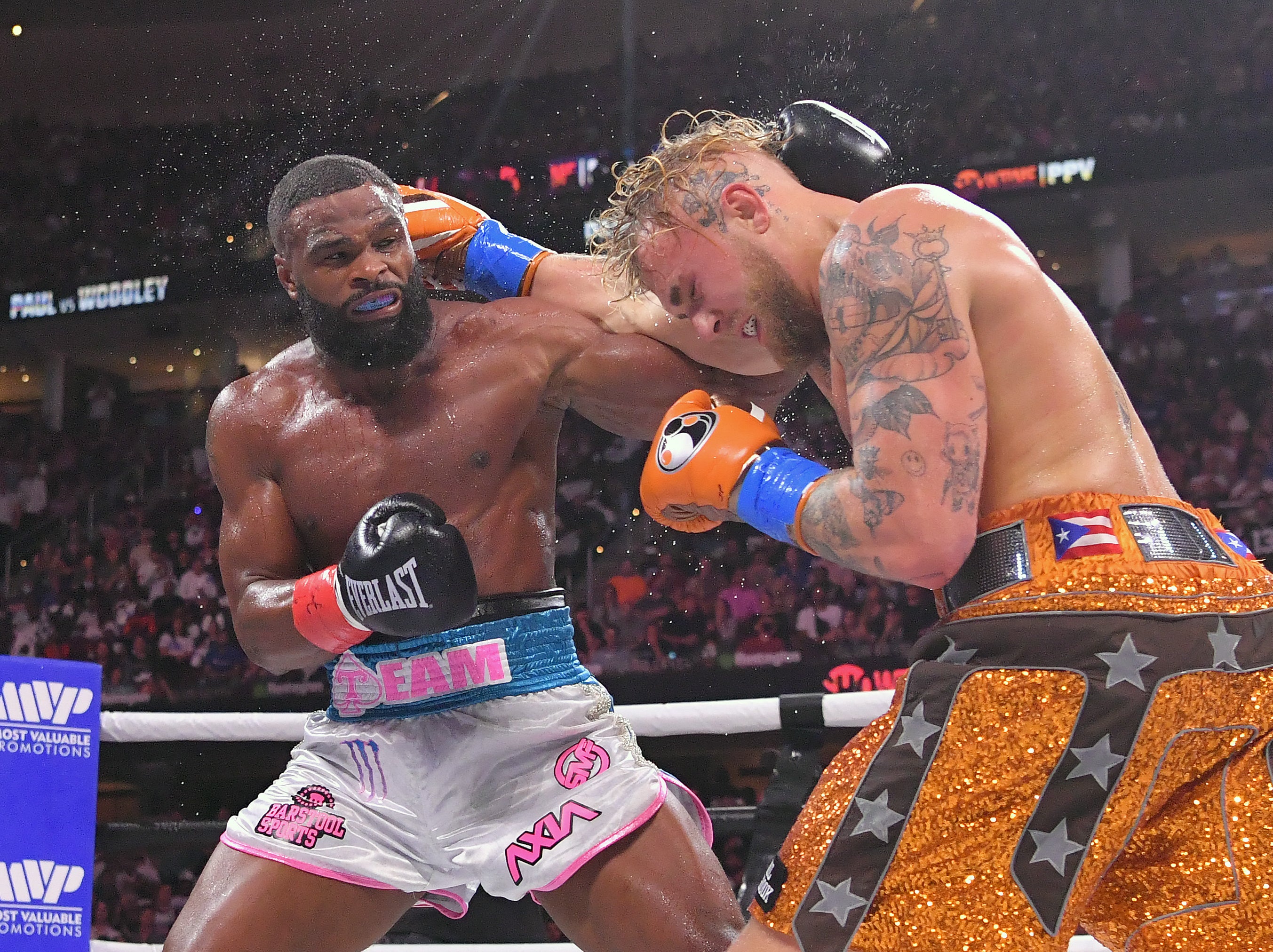 Tyron Woodley (left) was outpointed by Jake Paul this summer