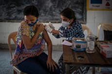 Indian states offer TVs, fridges and smartphones as vaccine drive lags