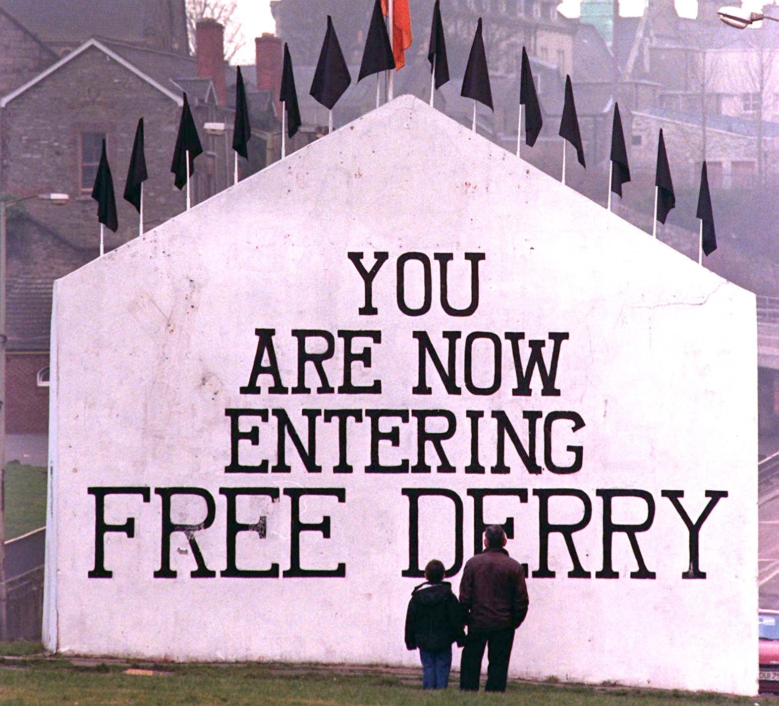 Fourteen black flags for the 14 victims of Bloody Sunday fly over Free Derry Corner in Londonderry, February 1997