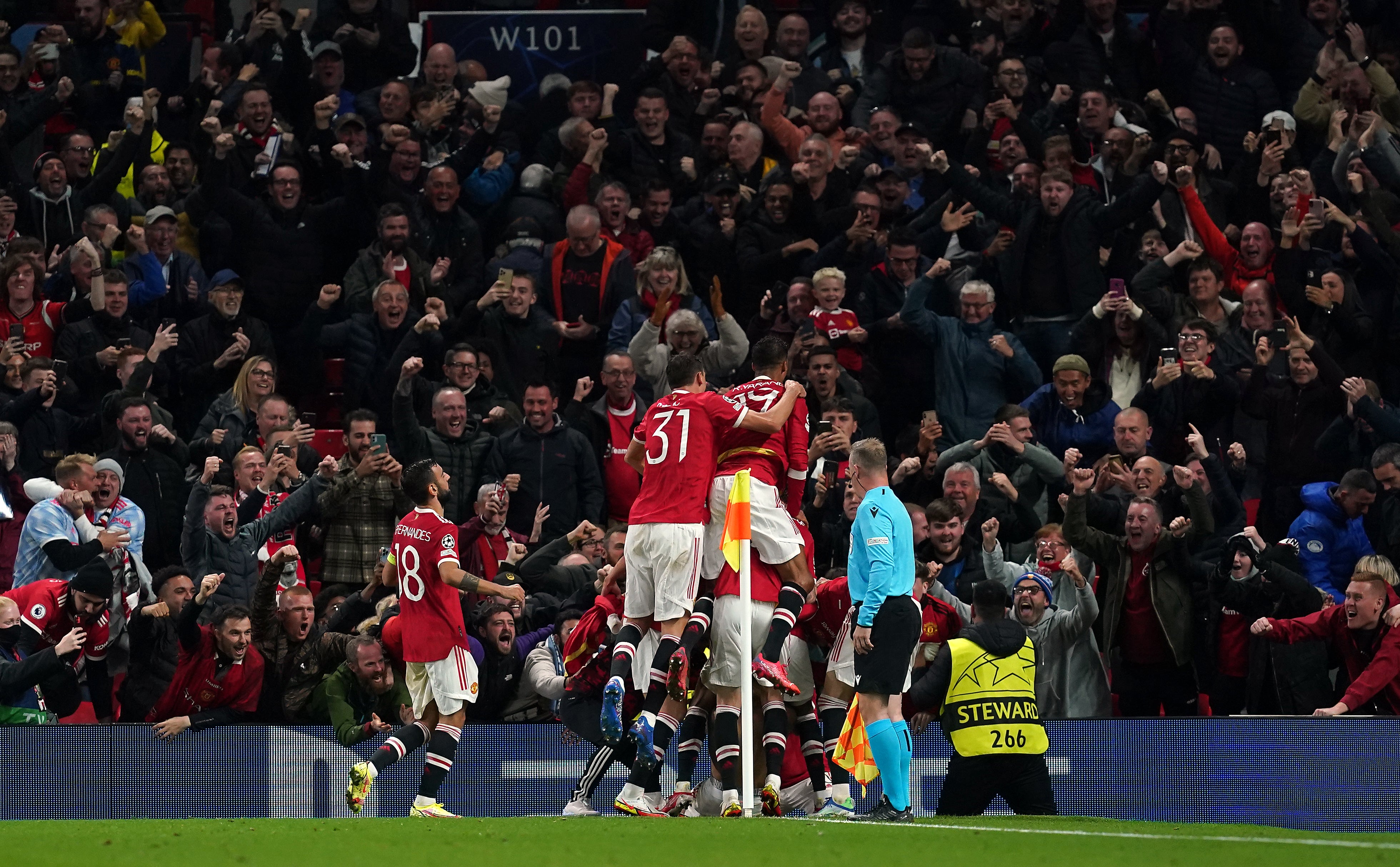 Manchester United have been fined for fan behaviour in their come-from-behind win over Villarreal (Martin Rickett/PA)