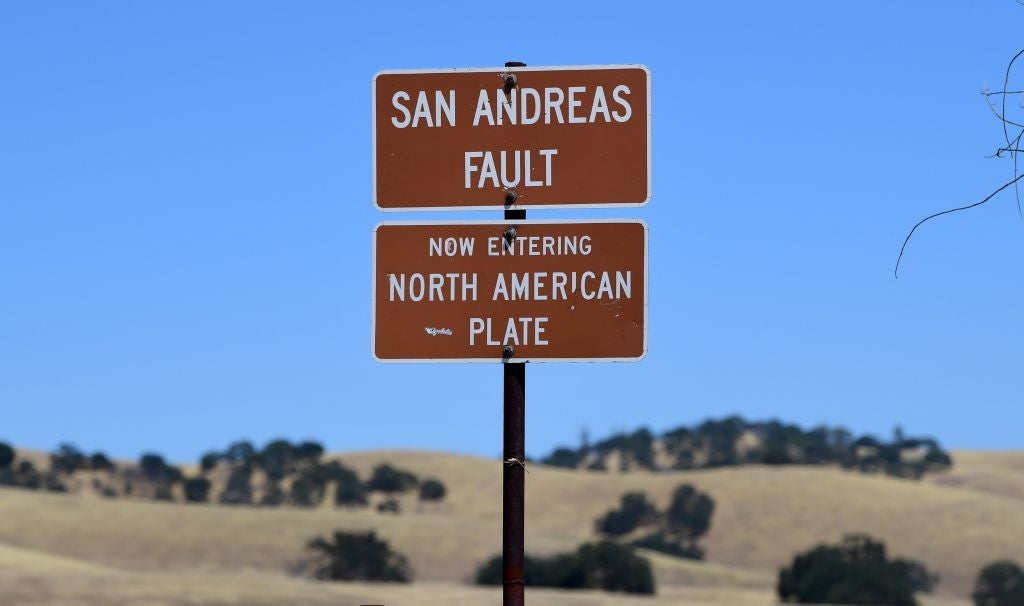 The San Andreas Fault is a tectonic boundary between the Pacific Plate, which is moving to the northwest at three inches each year and the North American Plate, heading south at about one inch per year.