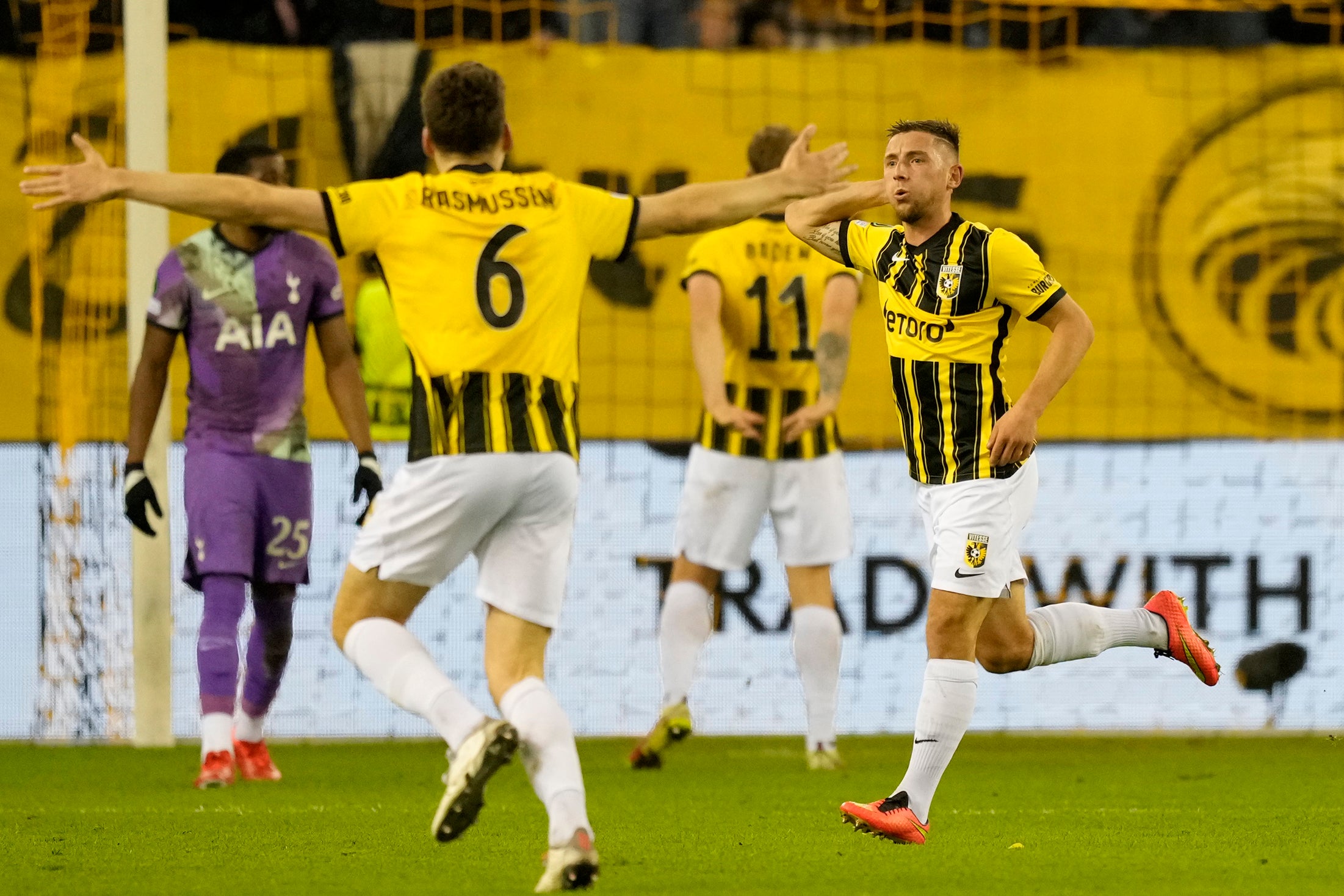 Maximilian Wittek, right, celebrates the winner (Peter Dejong/AP)