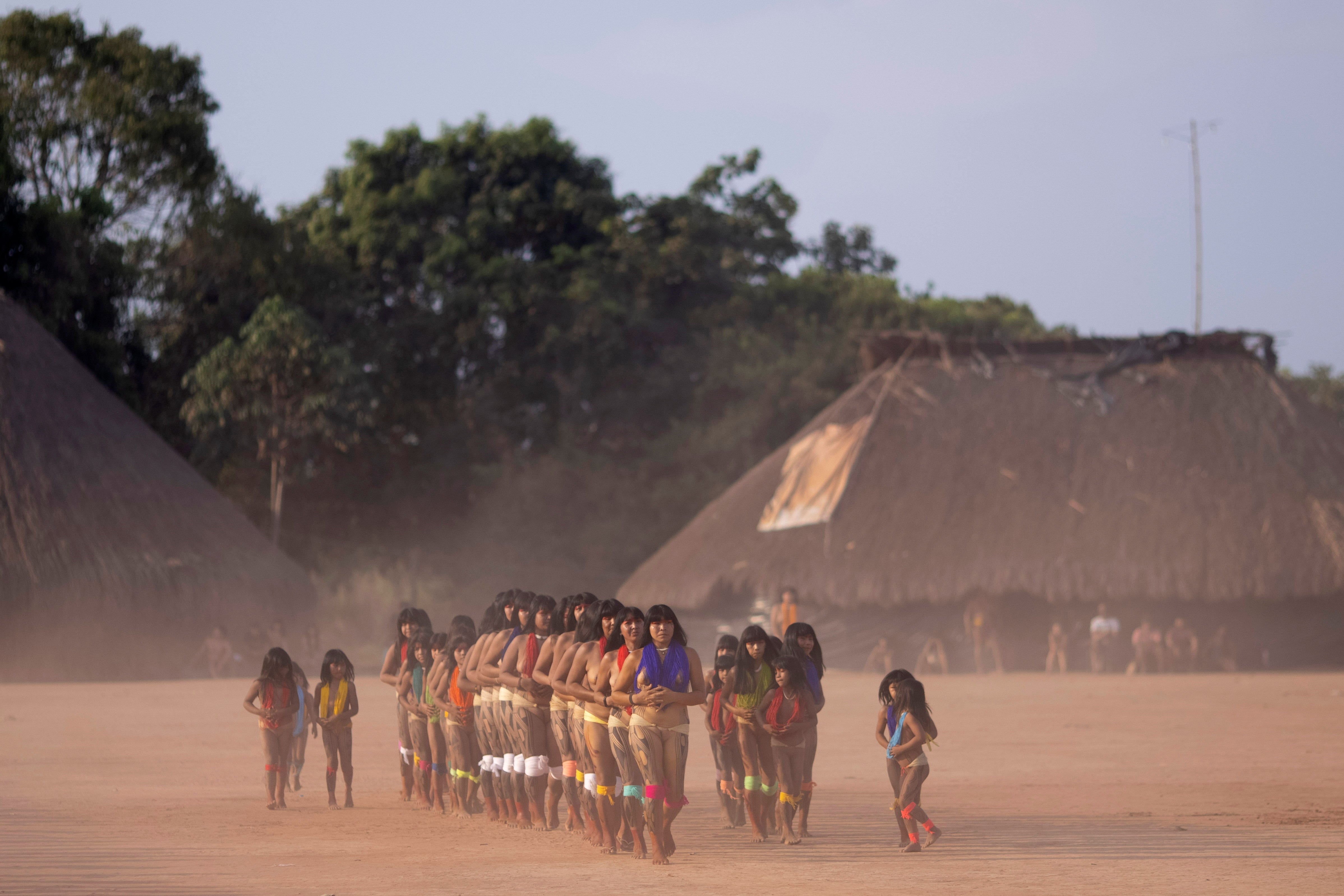 Yawalapiti women perform an end of mourning dance