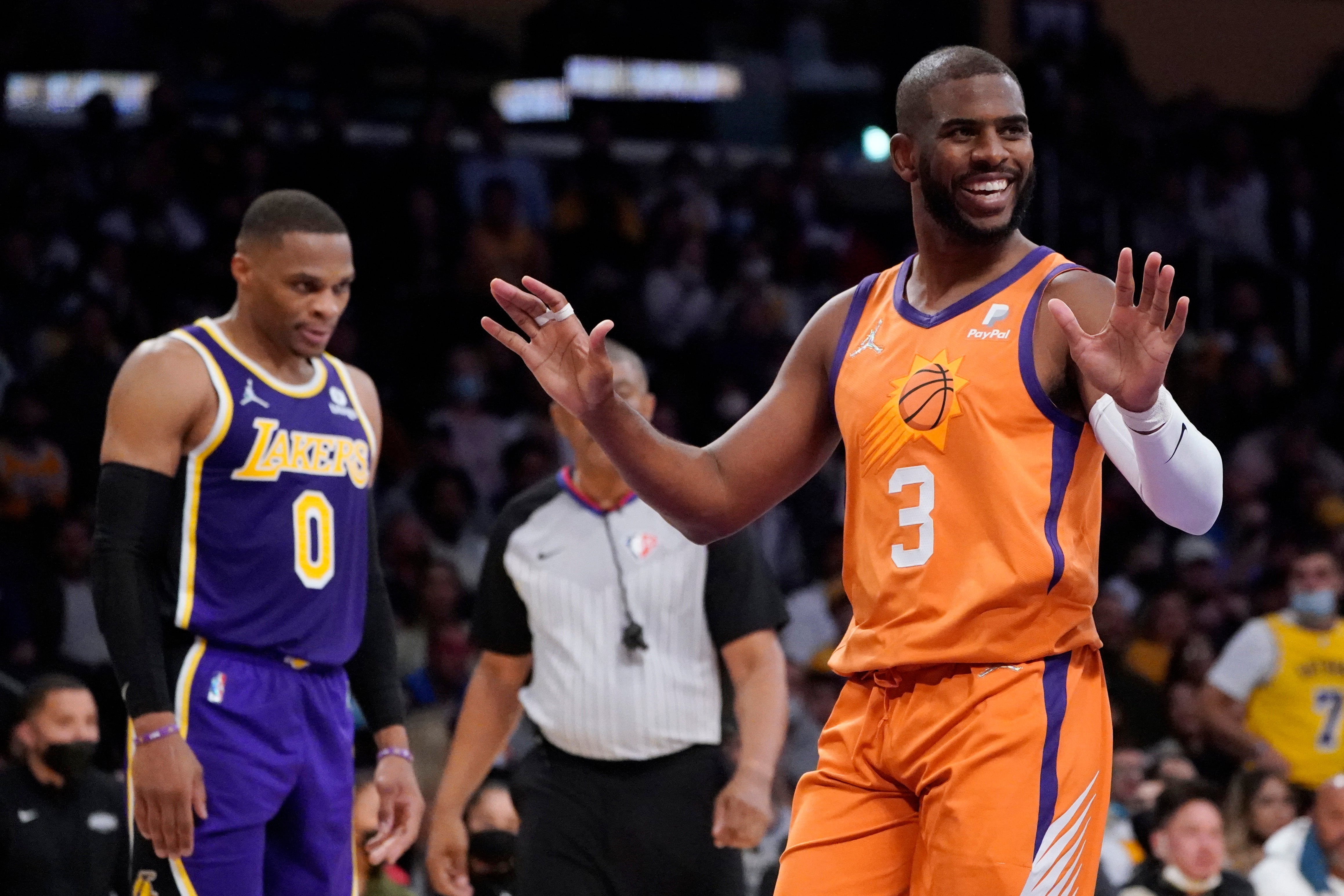 Phoenix Suns guard Chris Paul (3) argues a call during the first half of an NBA game against the Los Angeles Lakers (Marcio Jose Sanchez/AP)