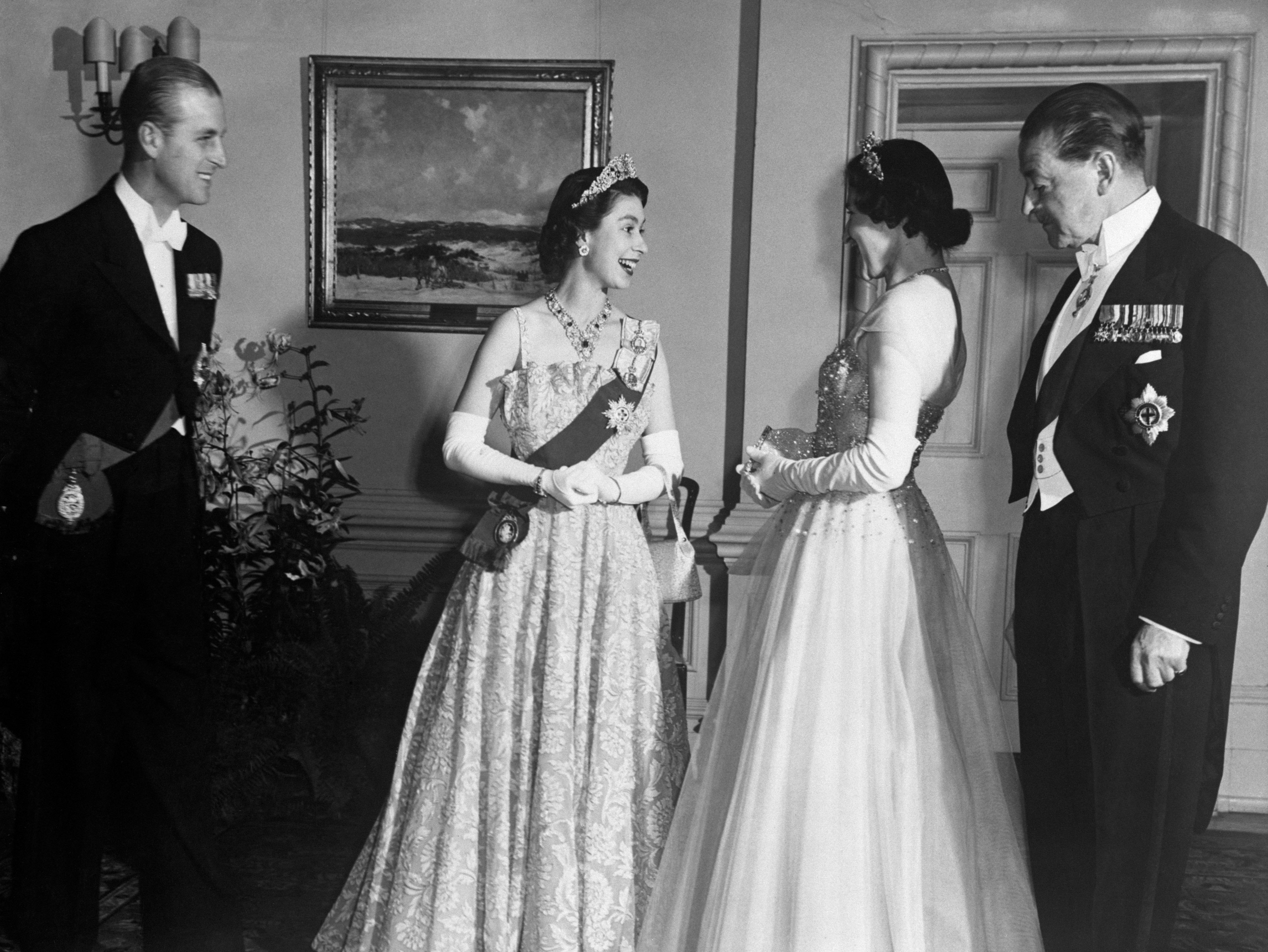 Princess Elizabeth and Prince Philip with Viscount and Lady Alexander at a Canadian state dinner in Ottawa