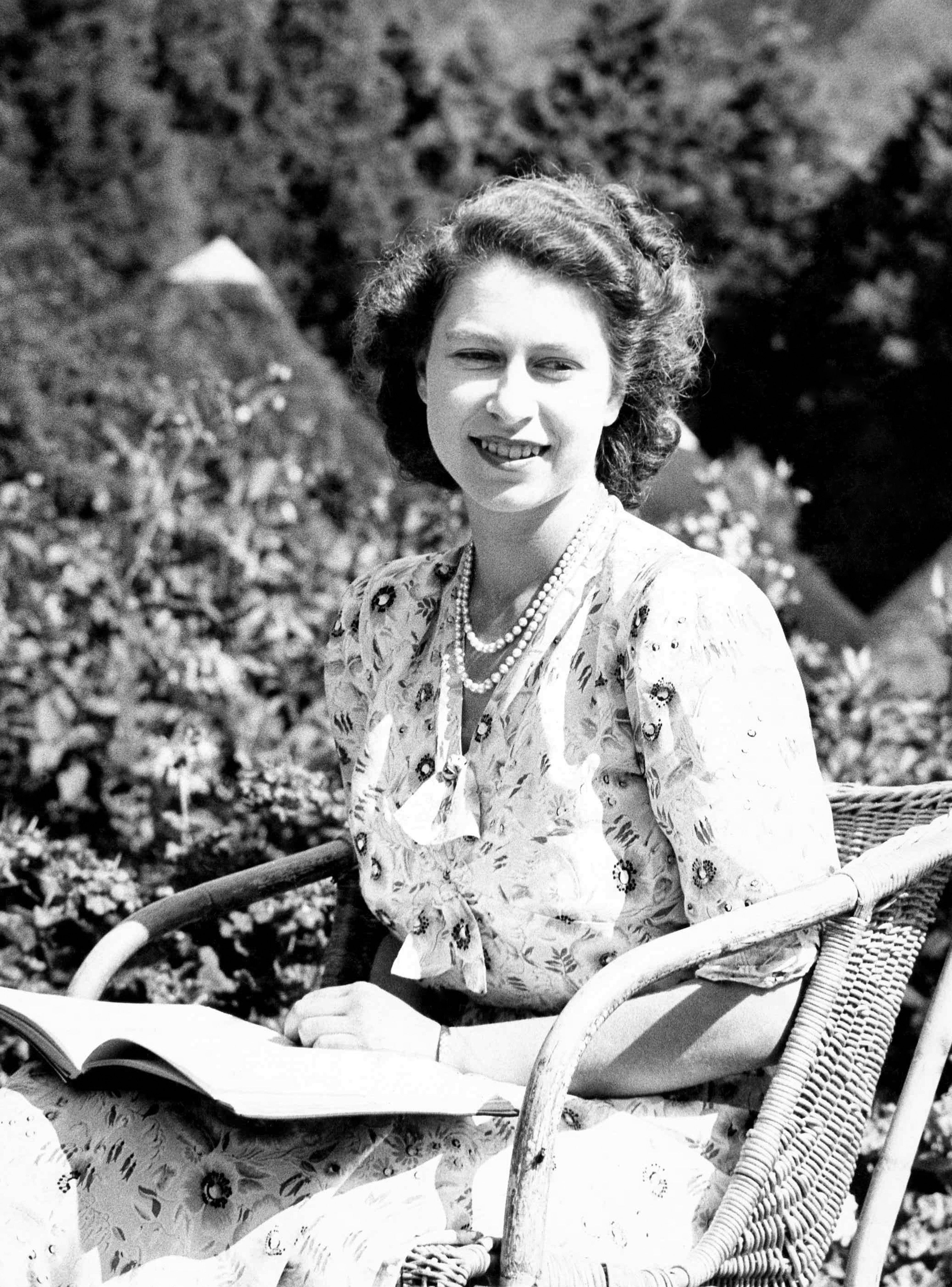 A special 21st birthday picture of Princess Elizabeth poses informally during a visit to the Natal National Park in South Africa