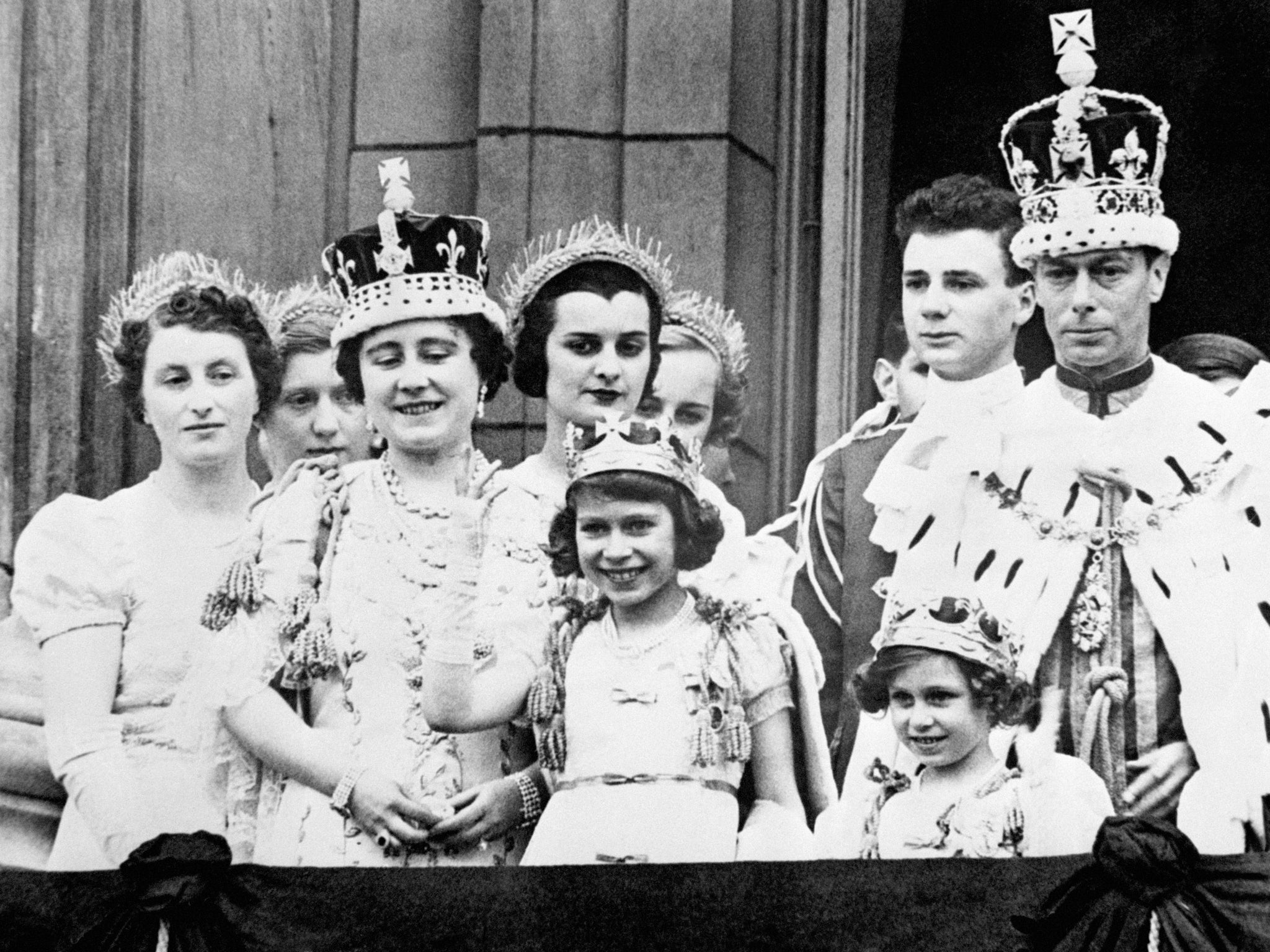 From left: Queen Elizabeth (later the Queen Mother), Princess Elizabeth, Princess Margaret and King George VI after his coronation, on the balcony of Buckingham Palace, London in May 1937