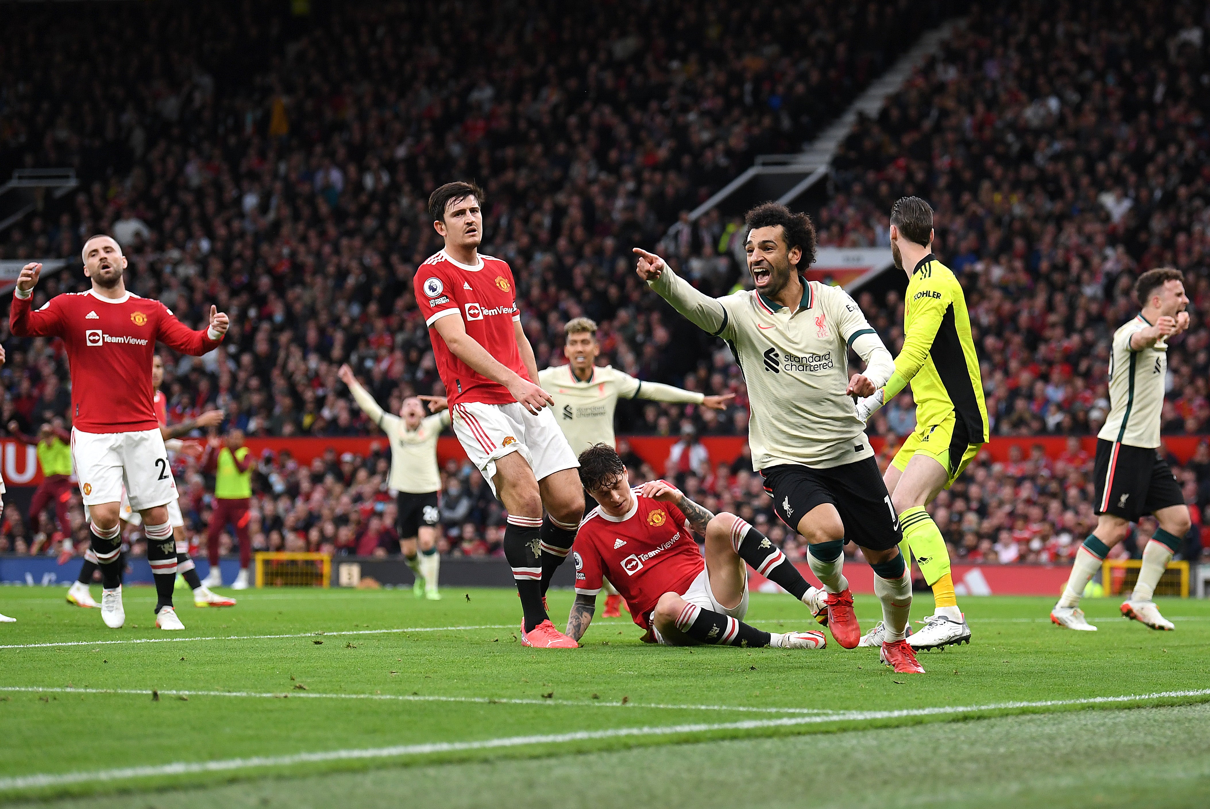 Mohamed Salah celebrates scoring Liverpool’s third – the first of his three goals