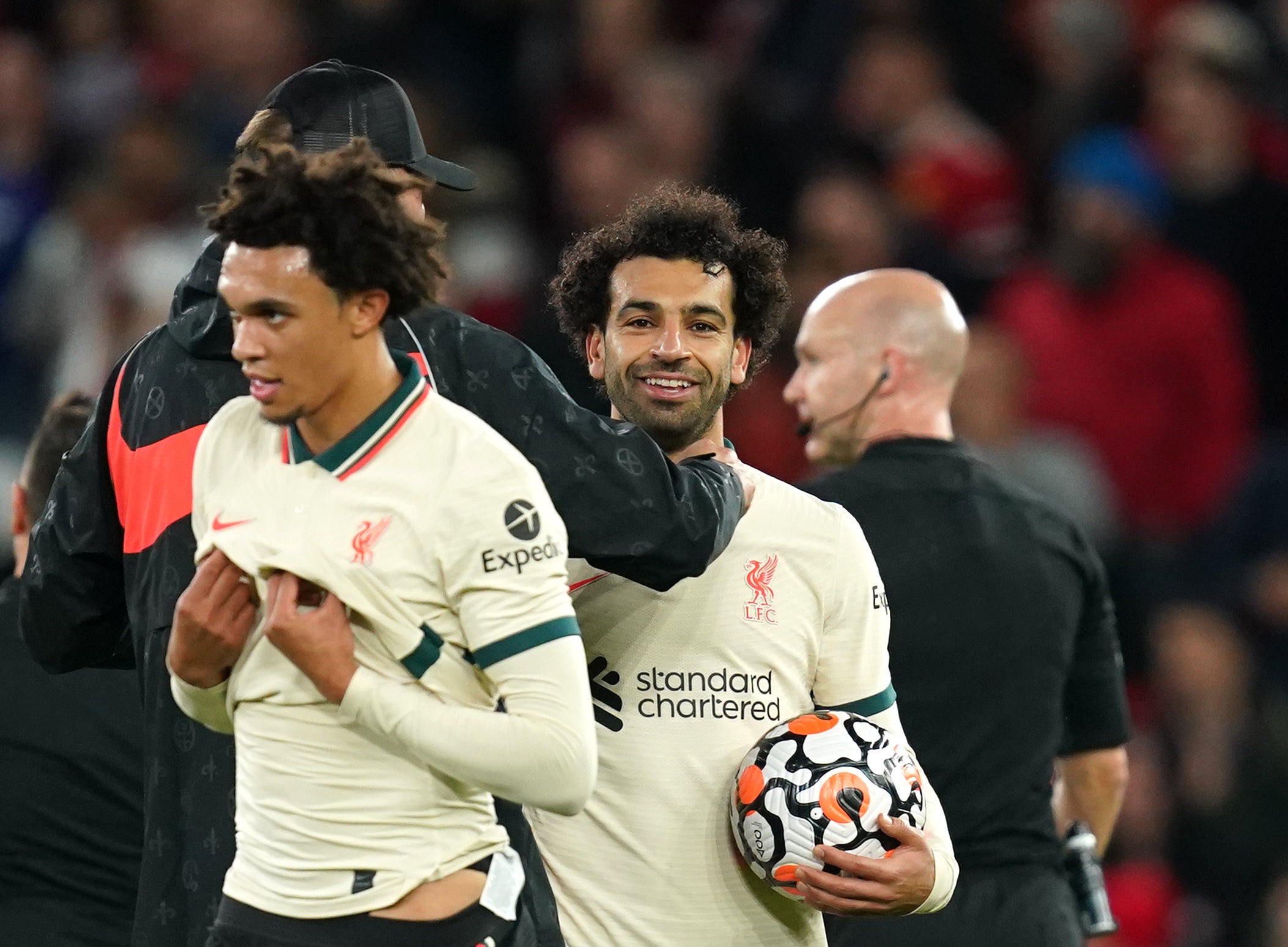 Liverpool hat-trick scorer Mohamed Salah celebrates with the match ball (Martin Rickett/PA)