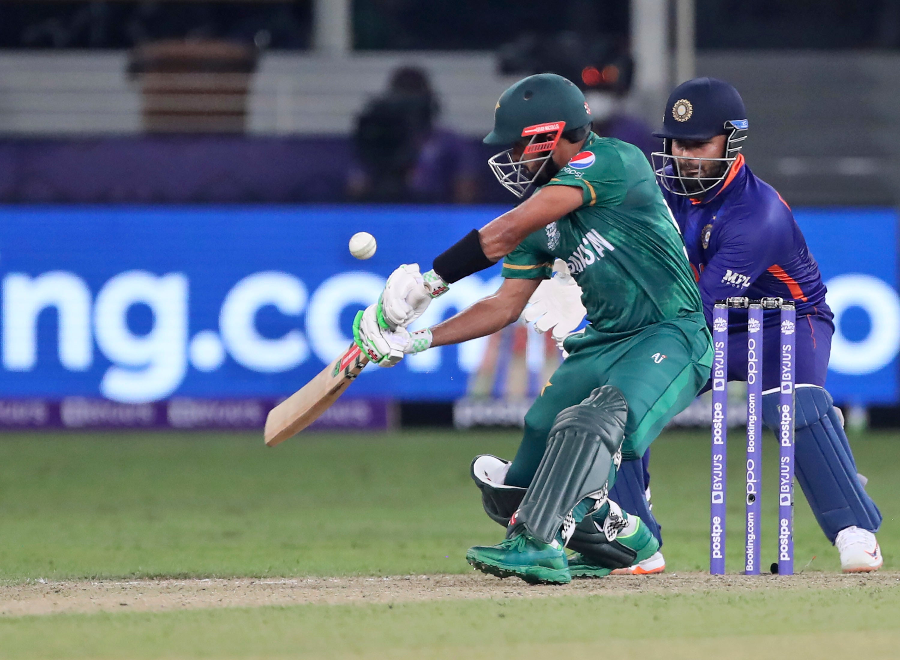 Babar Azam hits a boundary (Aijaz Rahi/AP)