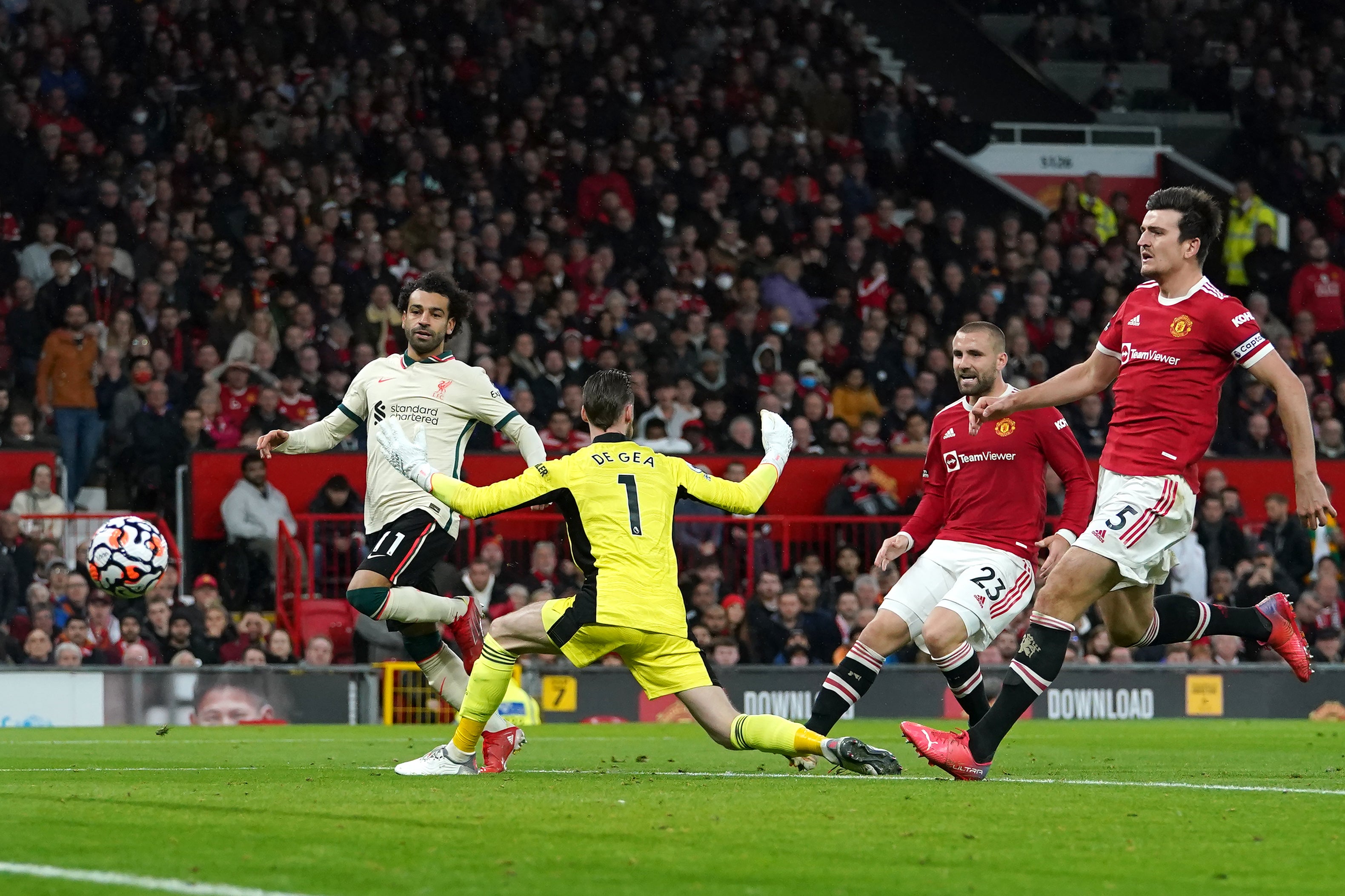 Liverpool’s Mohamed Salah (left) scored a hat-trick in the 5-0 win (Martin Rickett/PA)