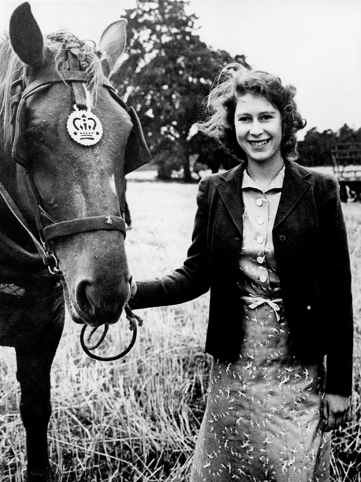 A teenage Princess Elizabeth at Sandringham with one of the horses