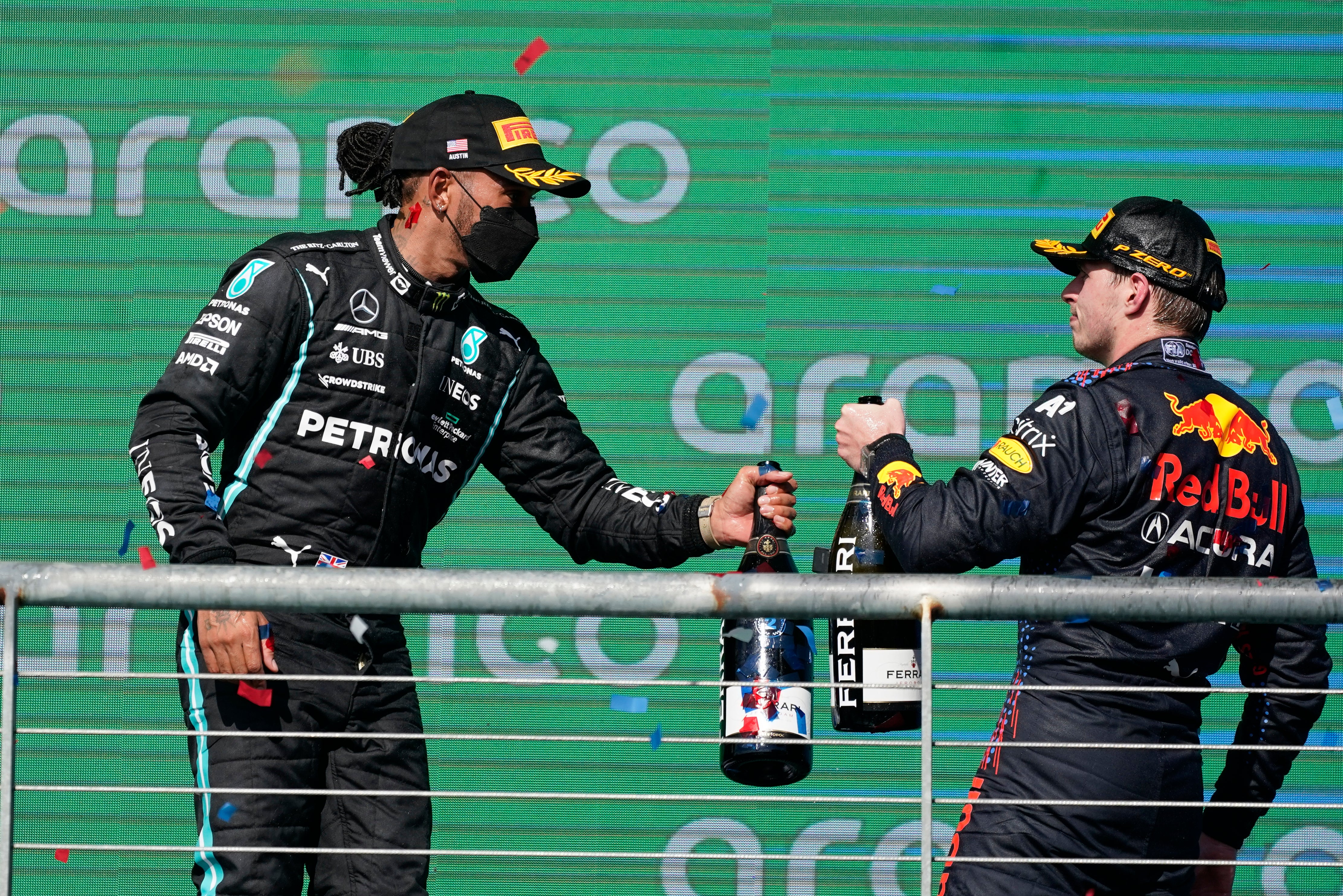 Red Bull driver Max Verstappen, right, boasts a 12 point lead over and Mercedes driver Lewis Hamilton